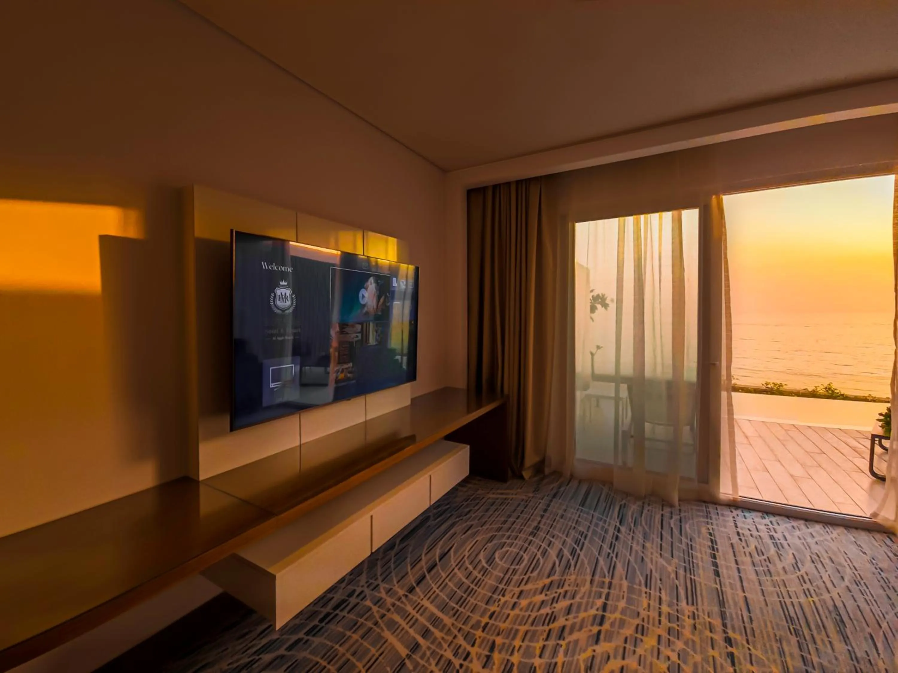 TV and multimedia in Royal M Al Aqah Beach Resort by Gewan