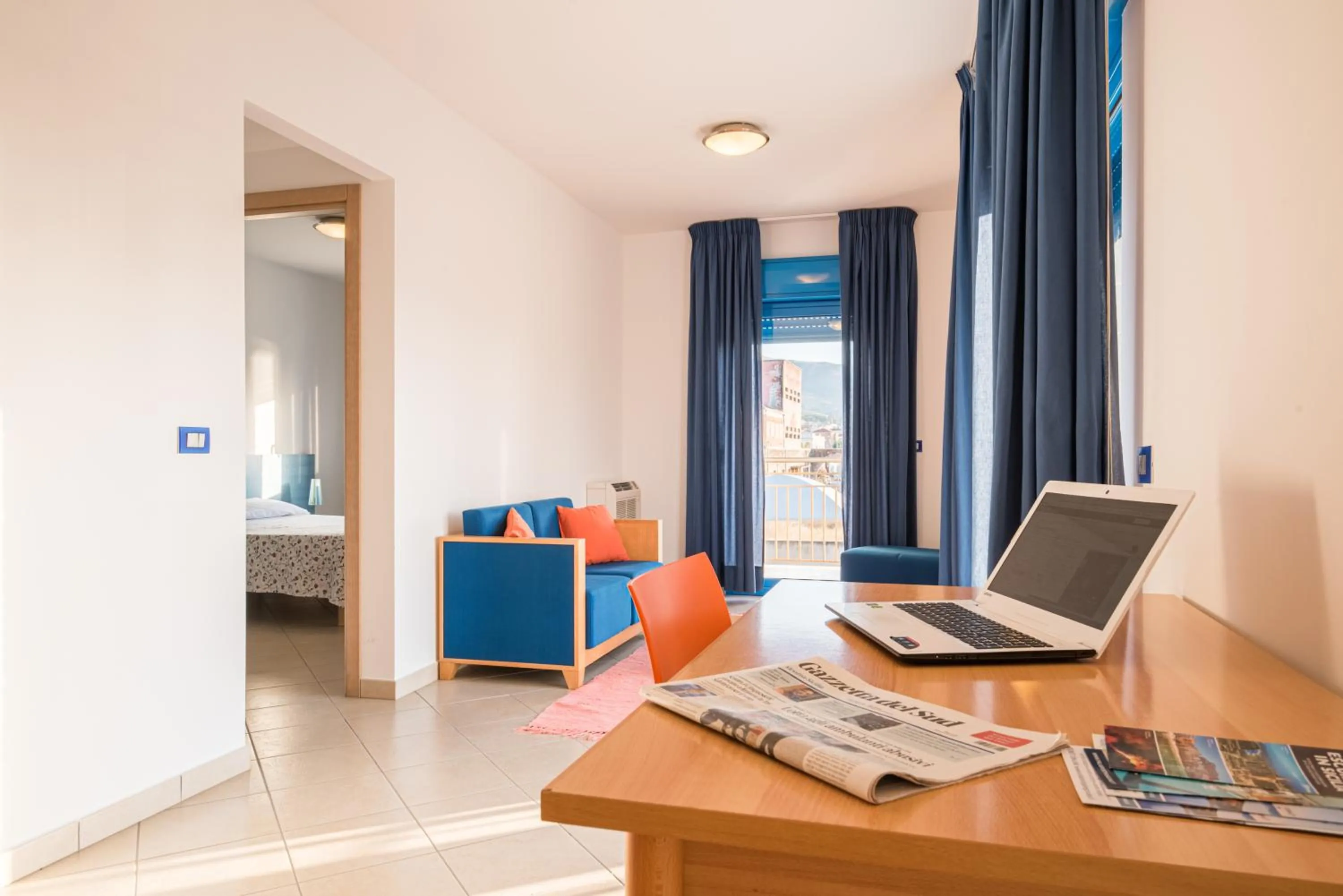 Seating area, Bed in Residence Miljunka