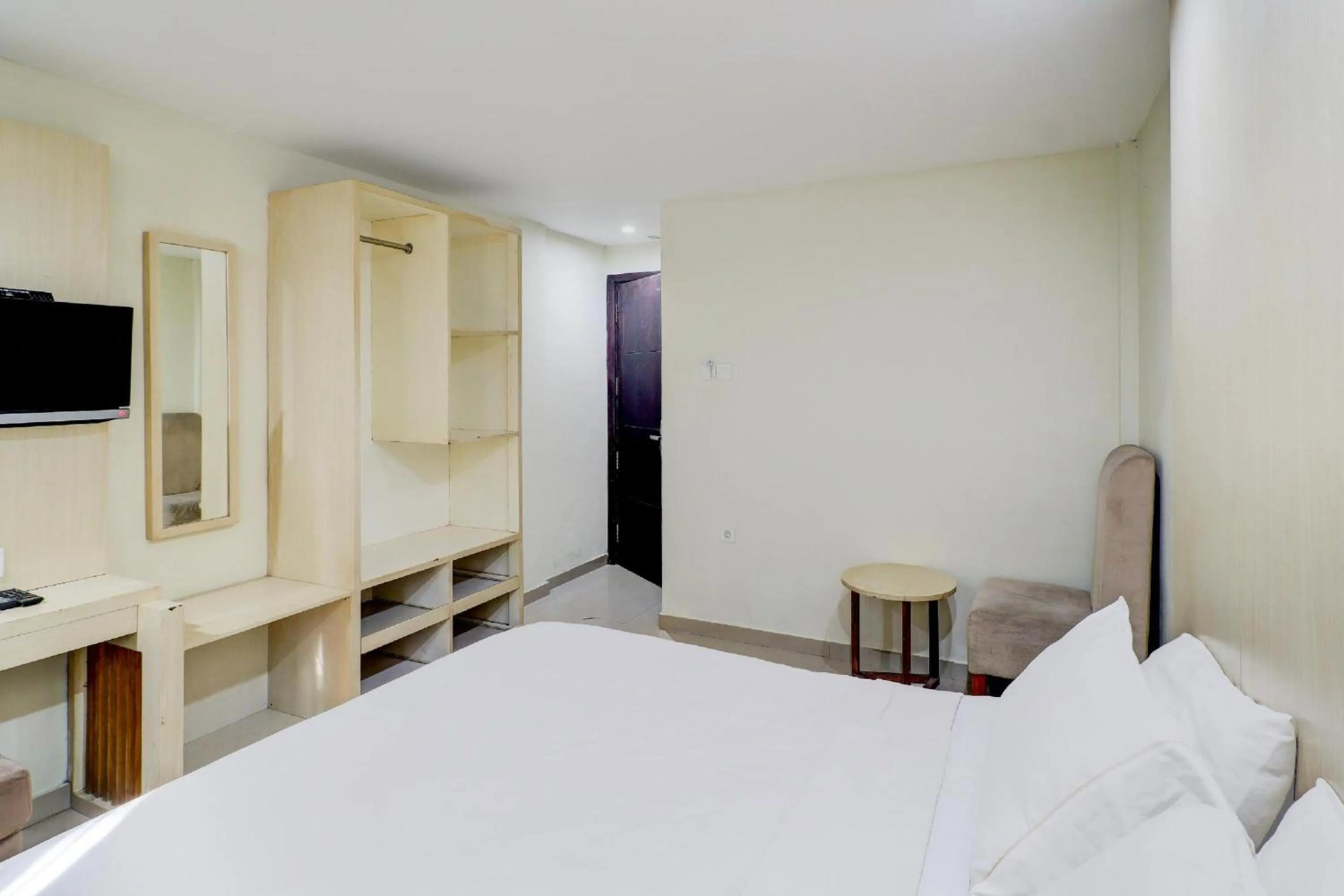 Photo of the whole room, Bed in Collection O Near Bajra Sandi Monumen Formerly Grand Pondok Puri Ayu