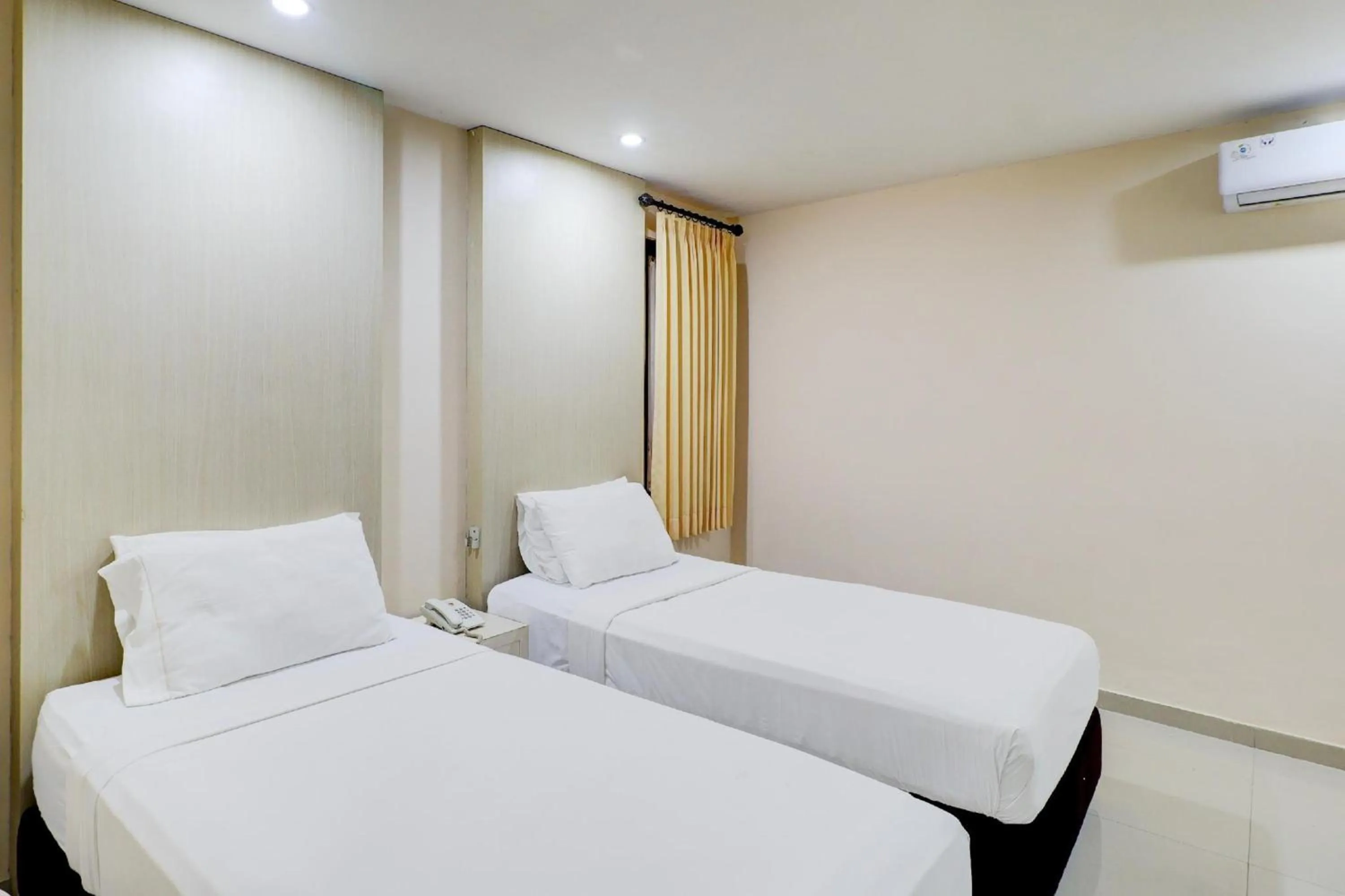 Photo of the whole room, Bed in Collection O Near Bajra Sandi Monumen Formerly Grand Pondok Puri Ayu