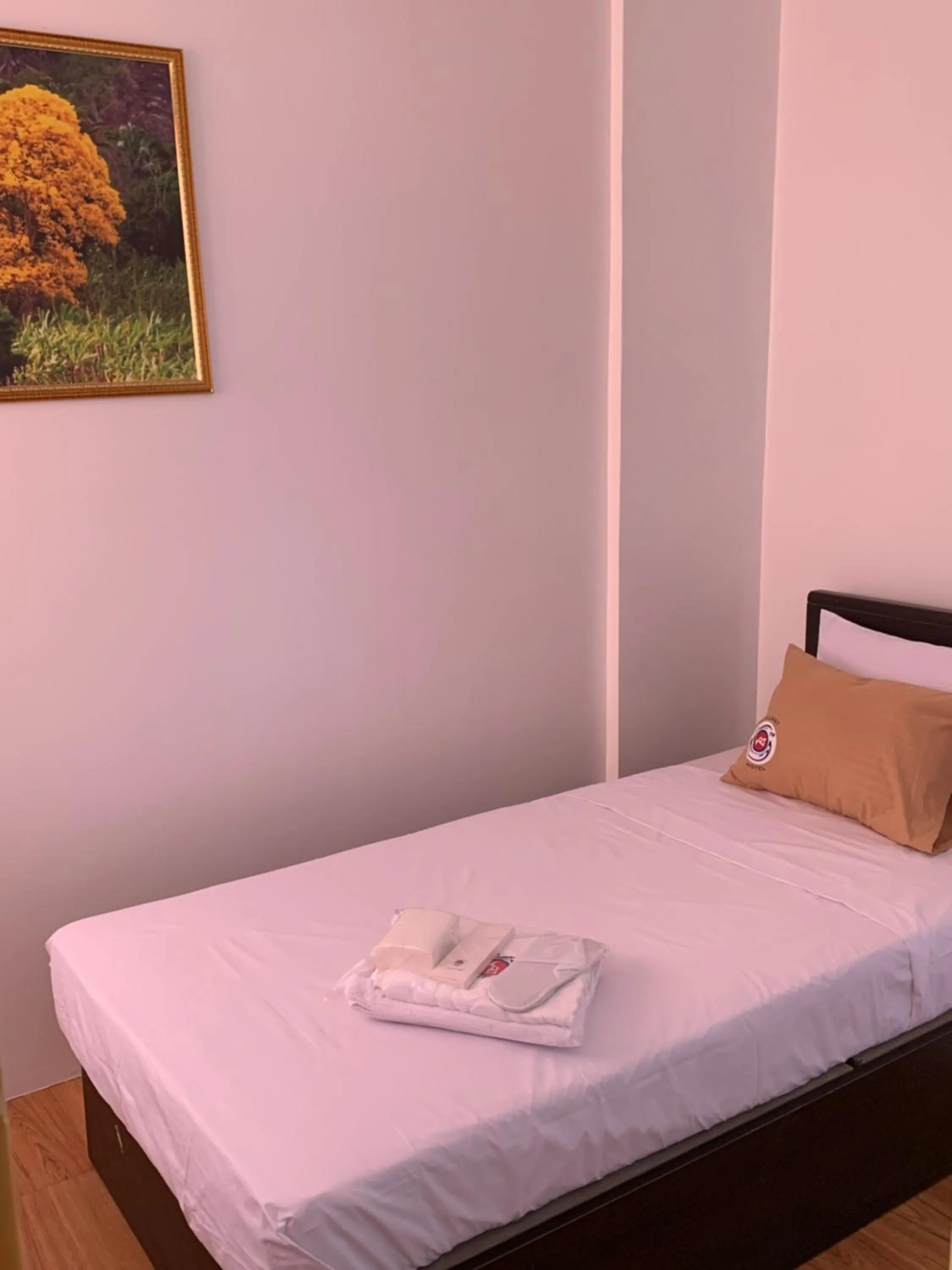 Bed in VRT Brilliant Hotel