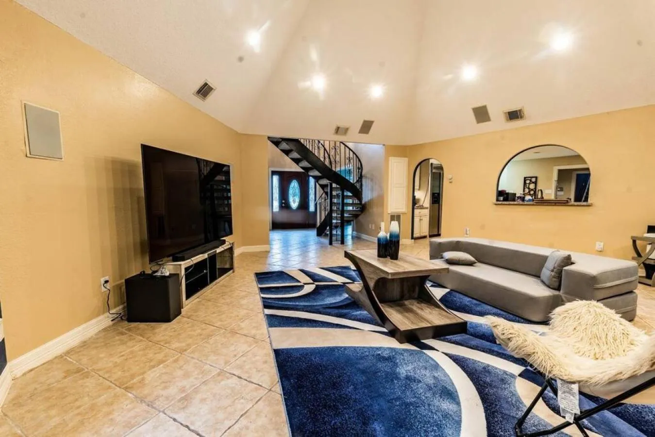 Living room in Huge 6 Bedroom with Pool, Spa, 85 Inch TV, Game Room