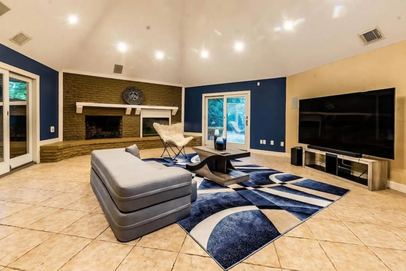 Living room in Huge 6 Bedroom with Pool, Spa, 85 Inch TV, Game Room