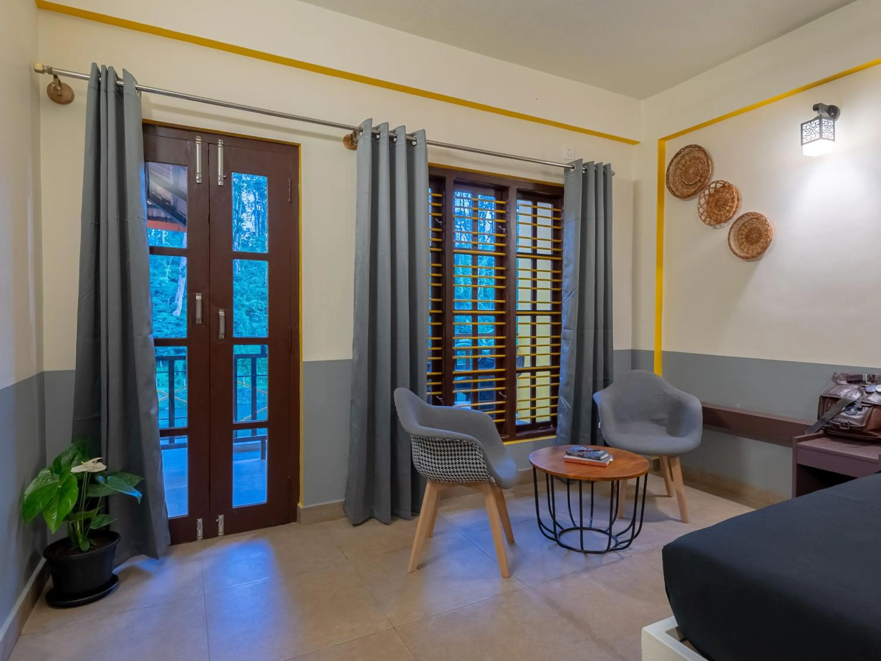 Seating area in The Hosteller Coorg Rainforest, Madikeri