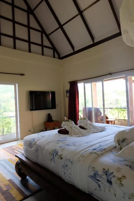 Photo of the whole room, Bed in Piman Pu