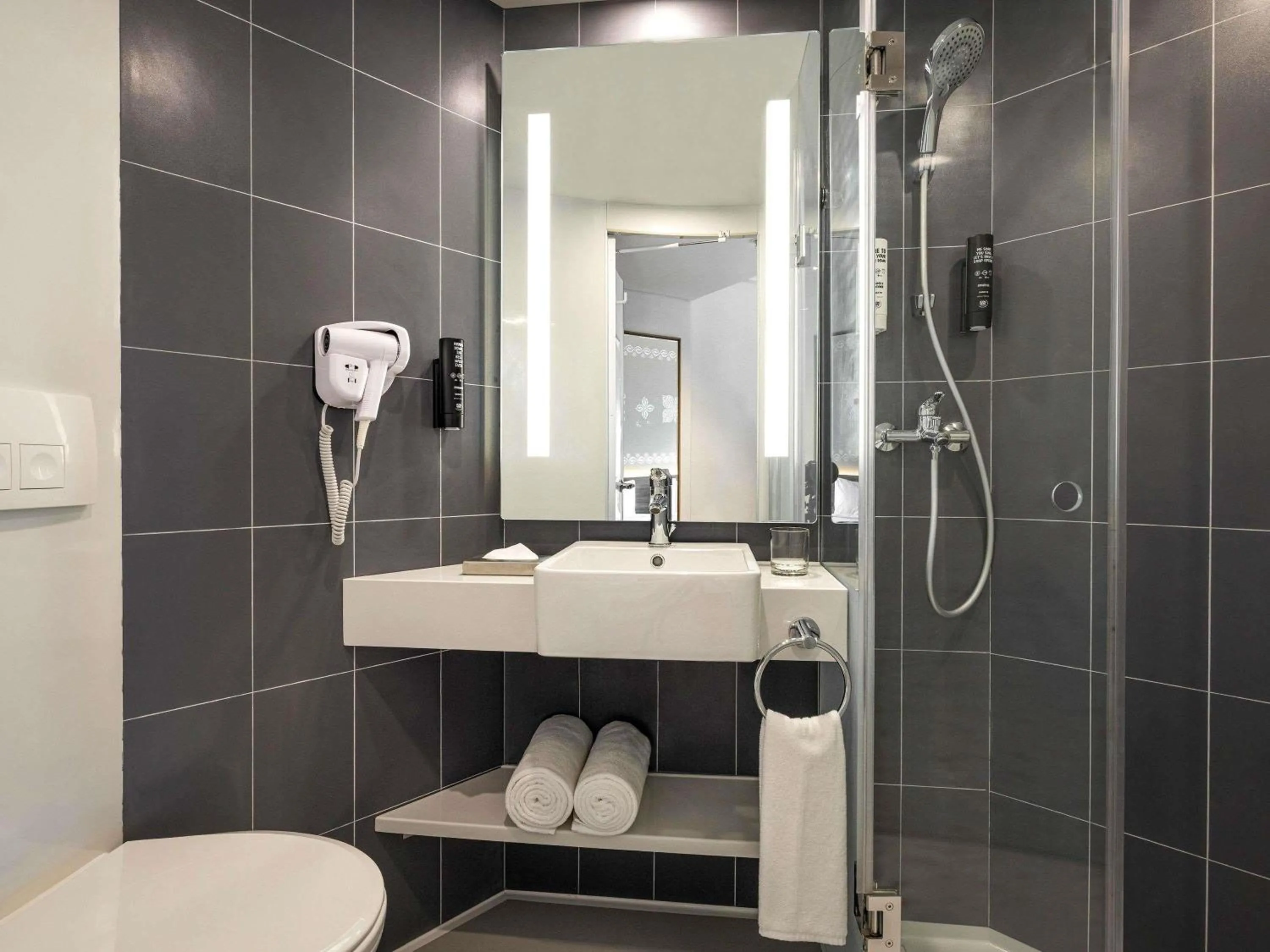 Bedroom in ibis Bengaluru Hebbal - An Accor Brand