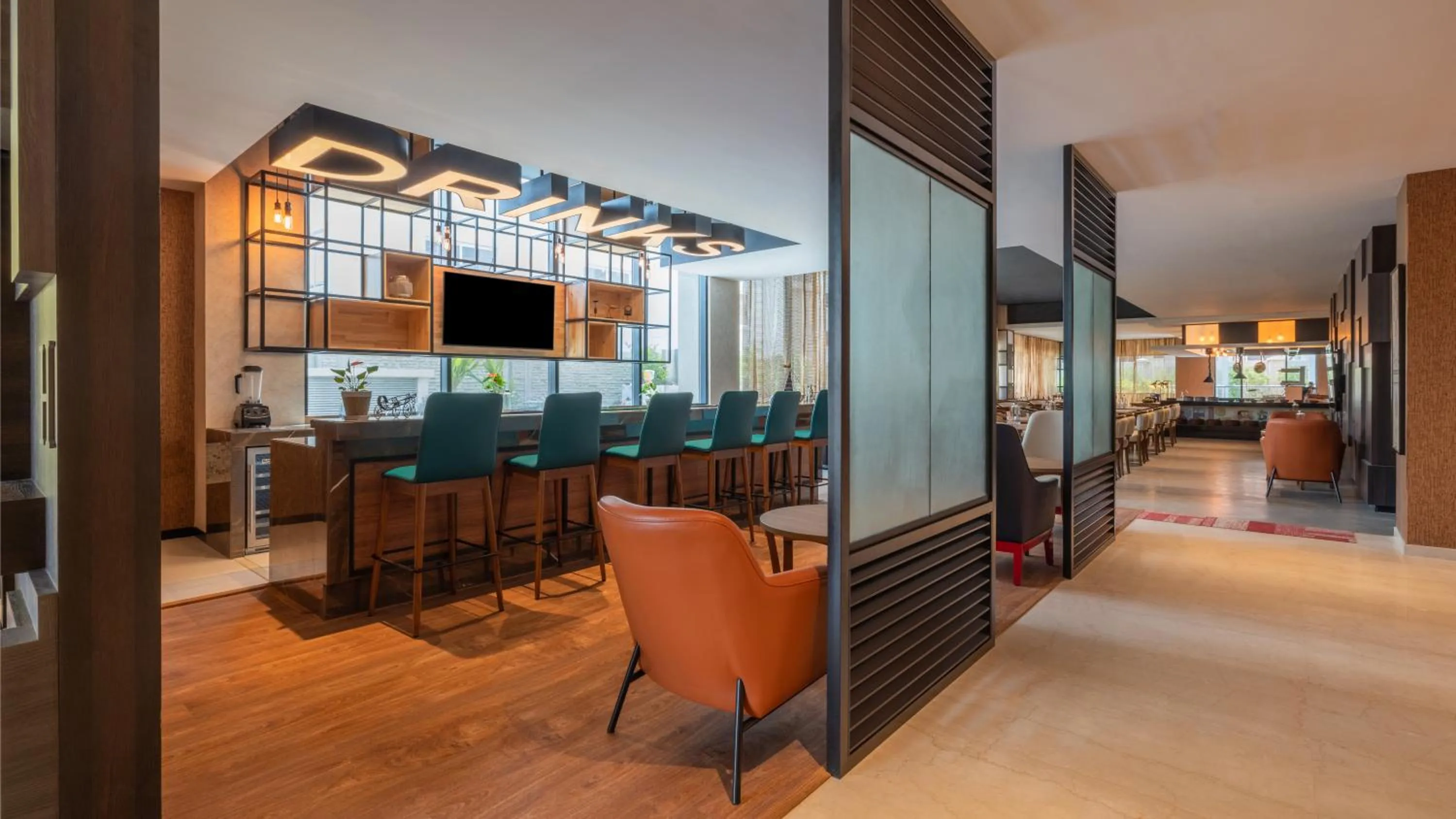 Lounge or bar in ibis Bengaluru Hebbal - An Accor Brand