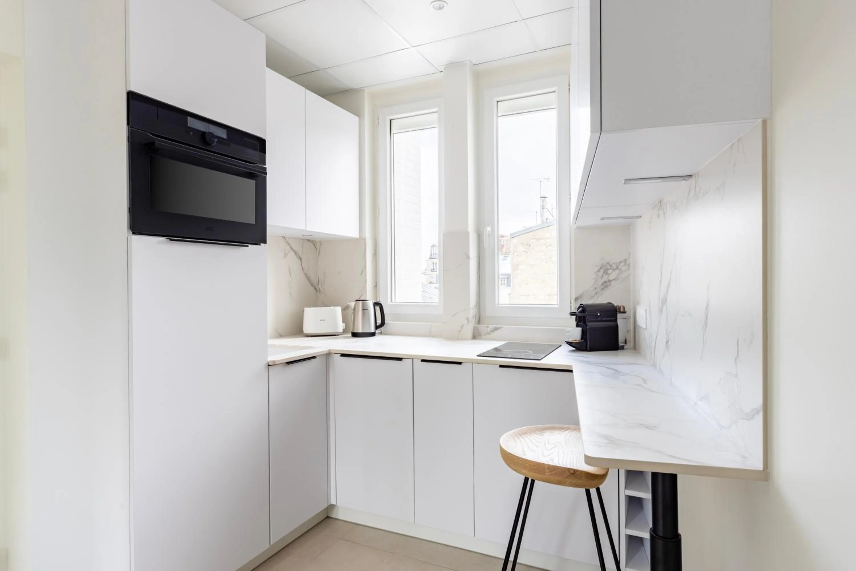 Kitchen or kitchenette in Appart Hôtel Résidence Courcelle