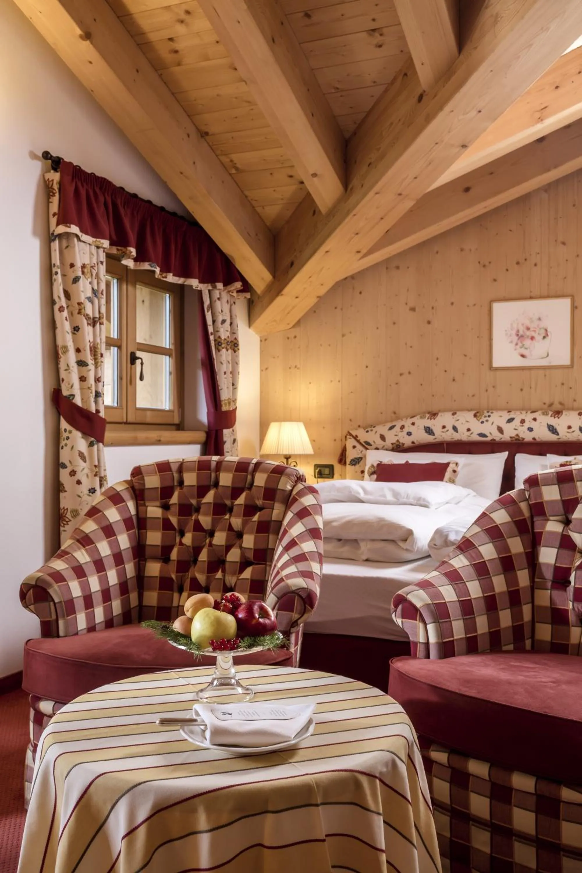 Seating area, Bed in Hotel Chalet Del Sogno