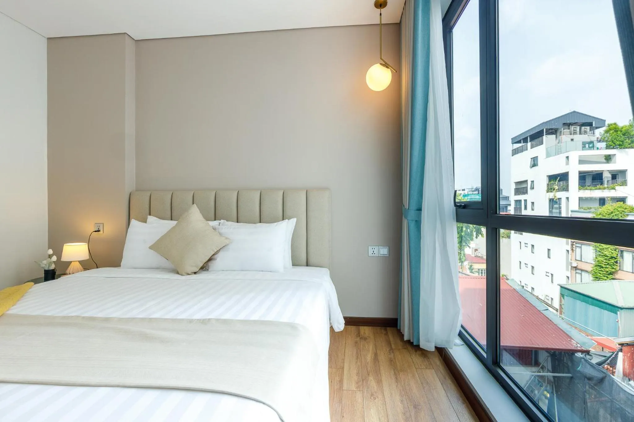 Bed in Margaery Boutique Apartment & Skyon9 Rooftop Bar