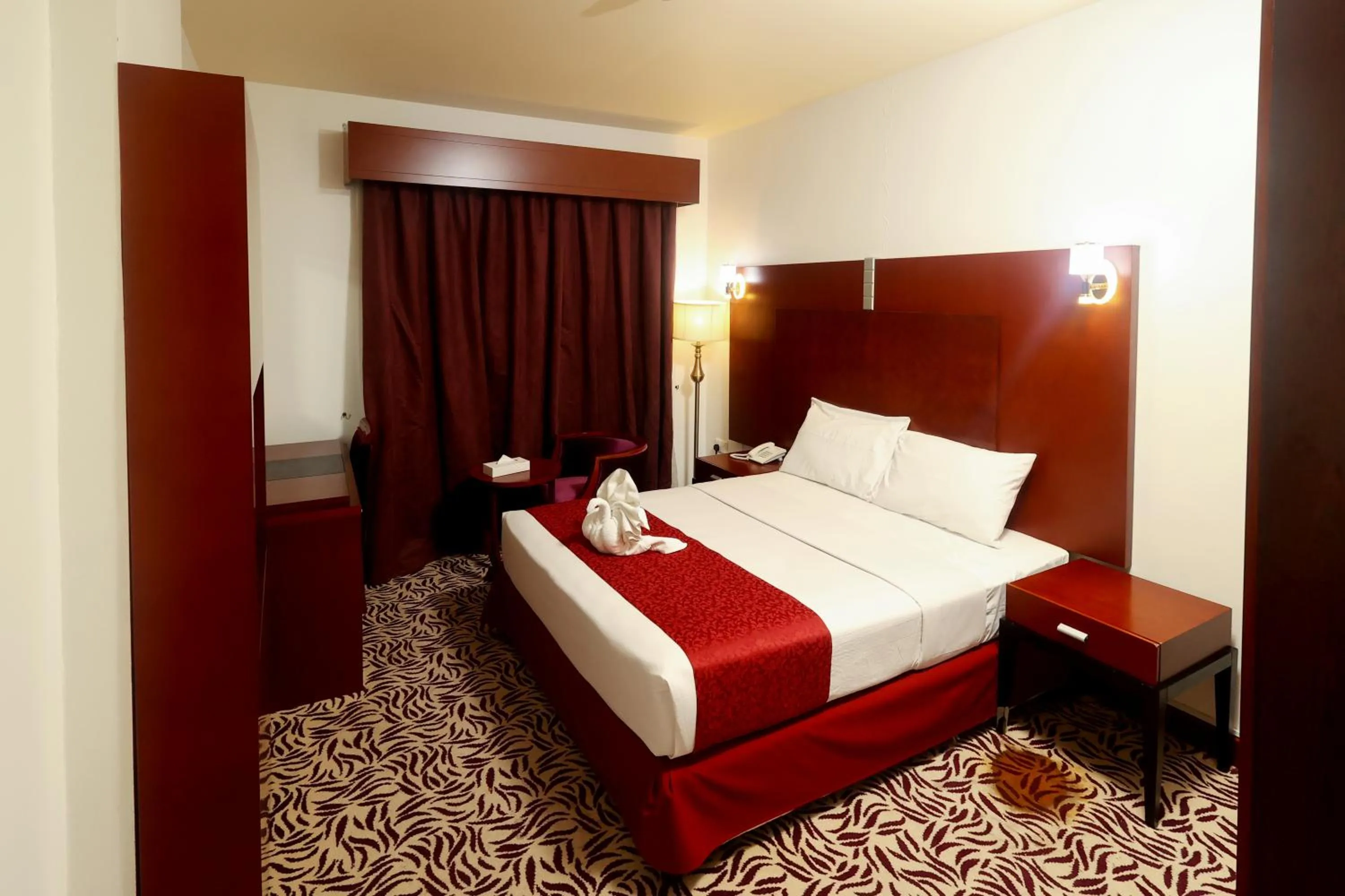 Bed in MRA Grand Hotel
