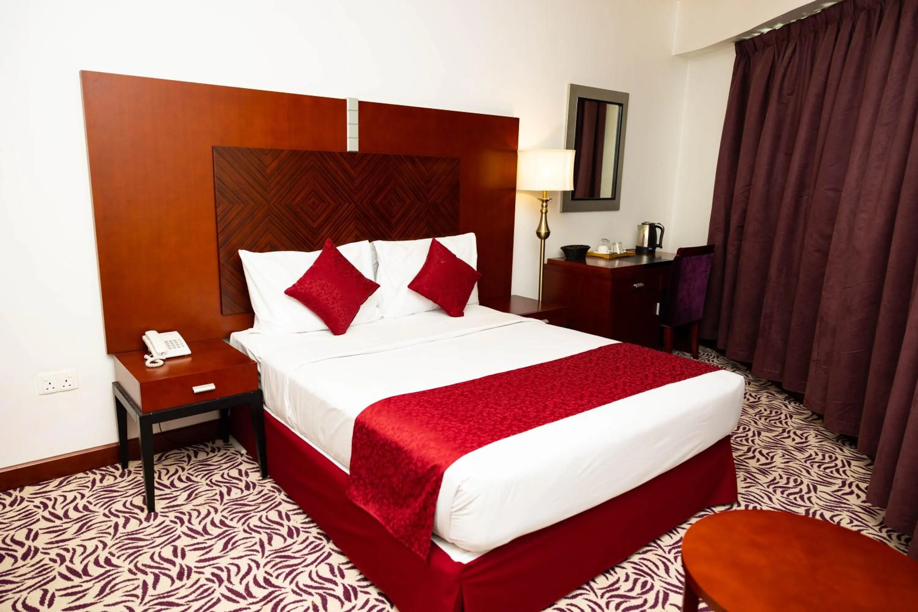 Bed in MRA Grand Hotel