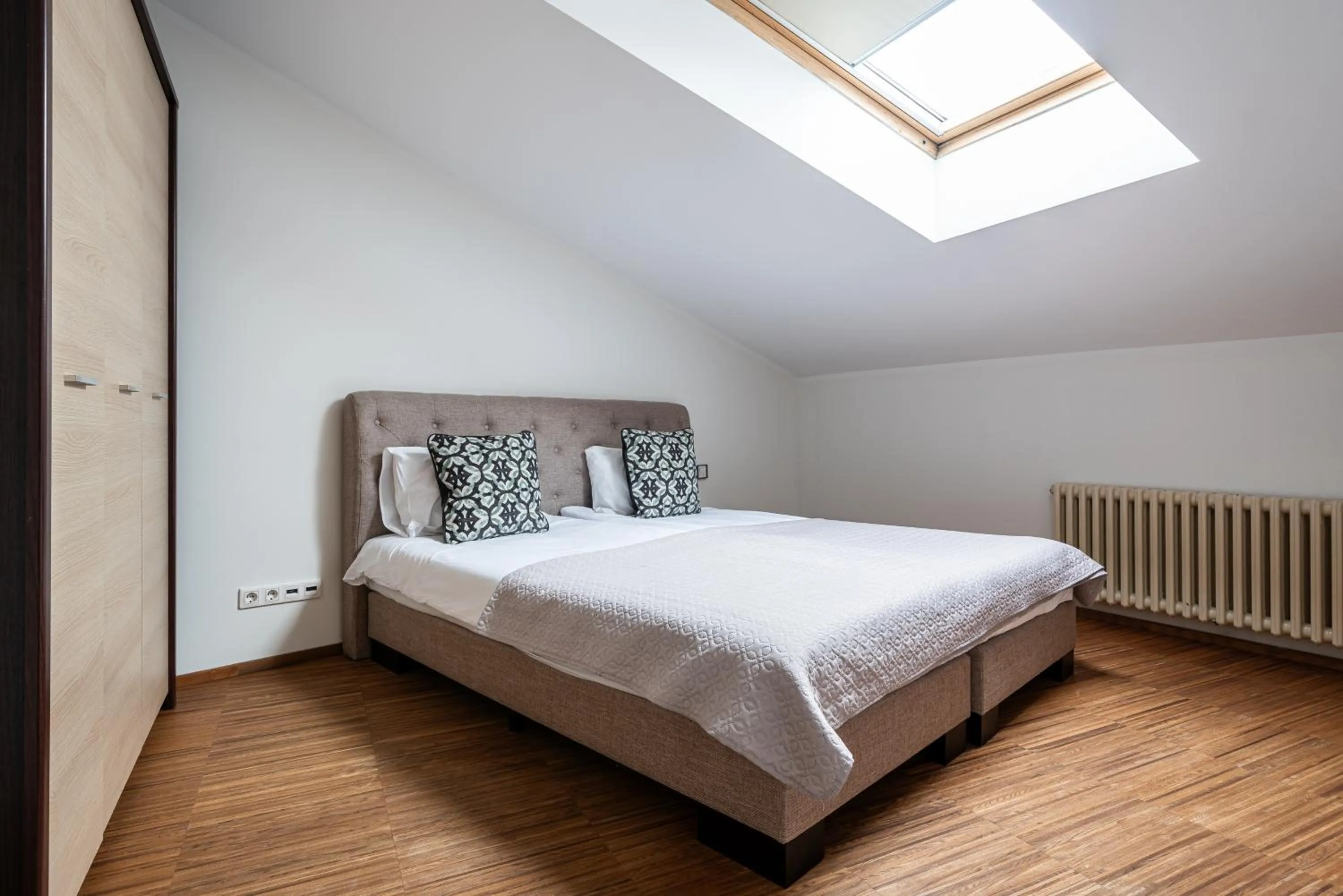 Bed in Yoga Residence Apartments