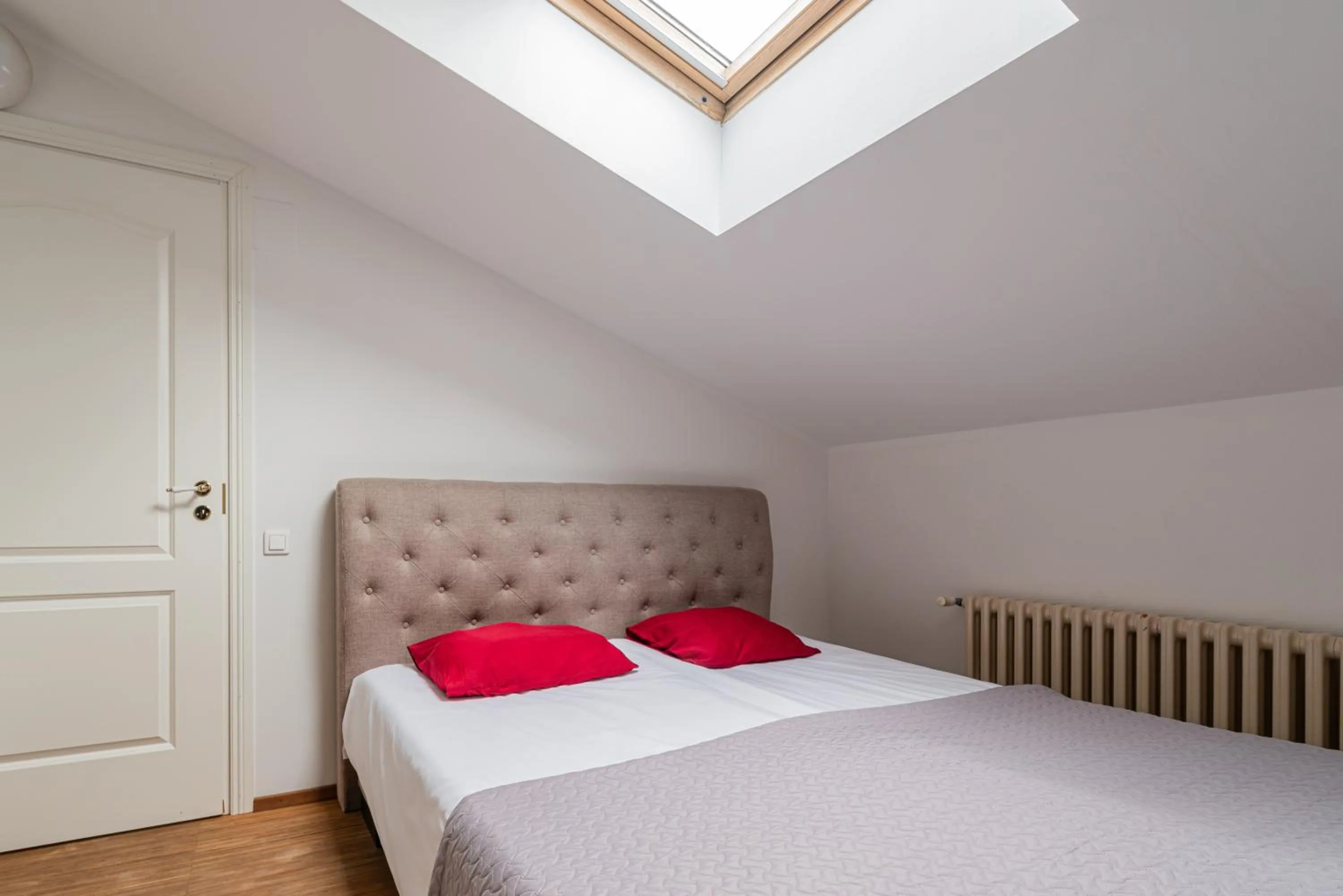 Bed in Yoga Residence Apartments