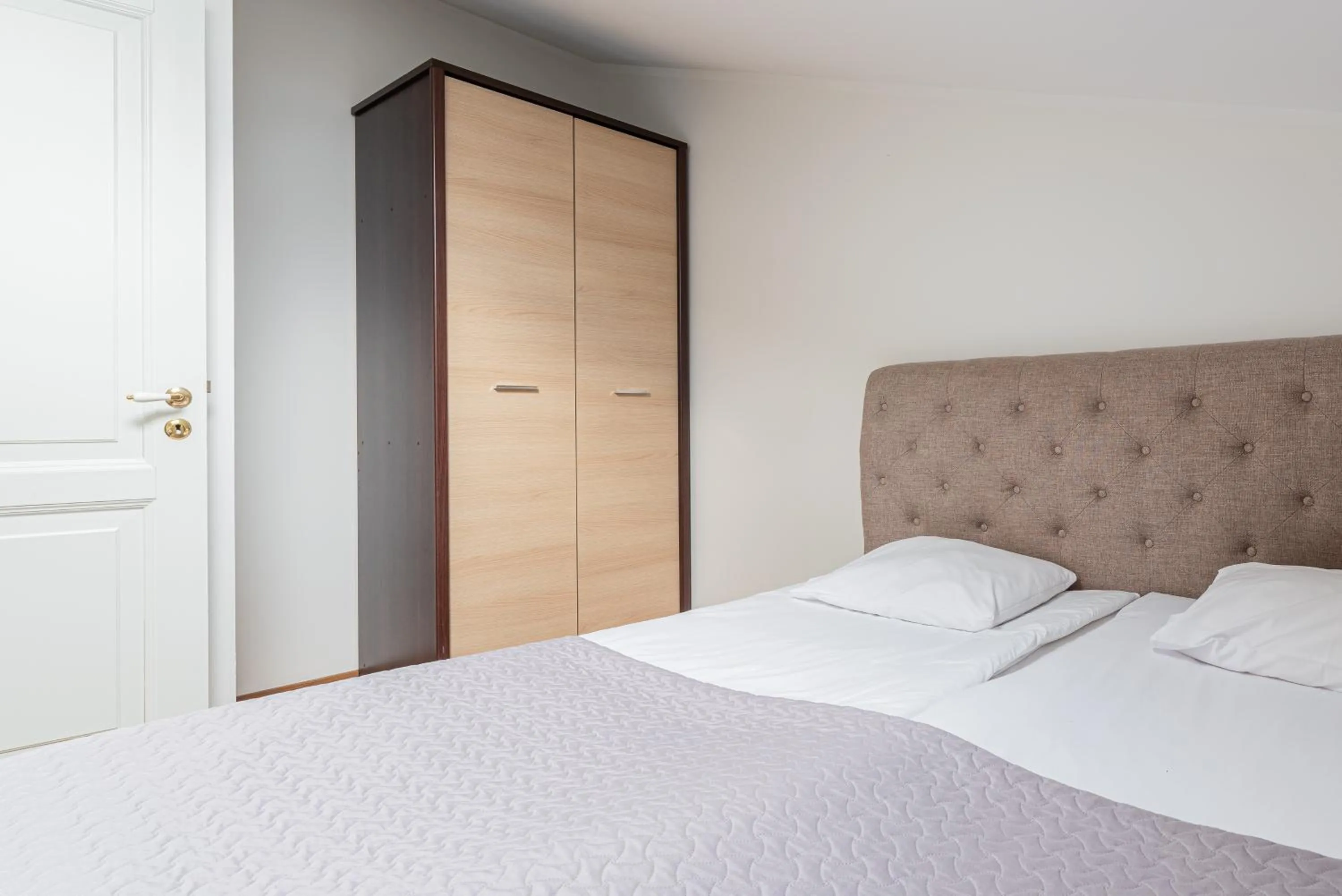 Bed in Yoga Residence Apartments