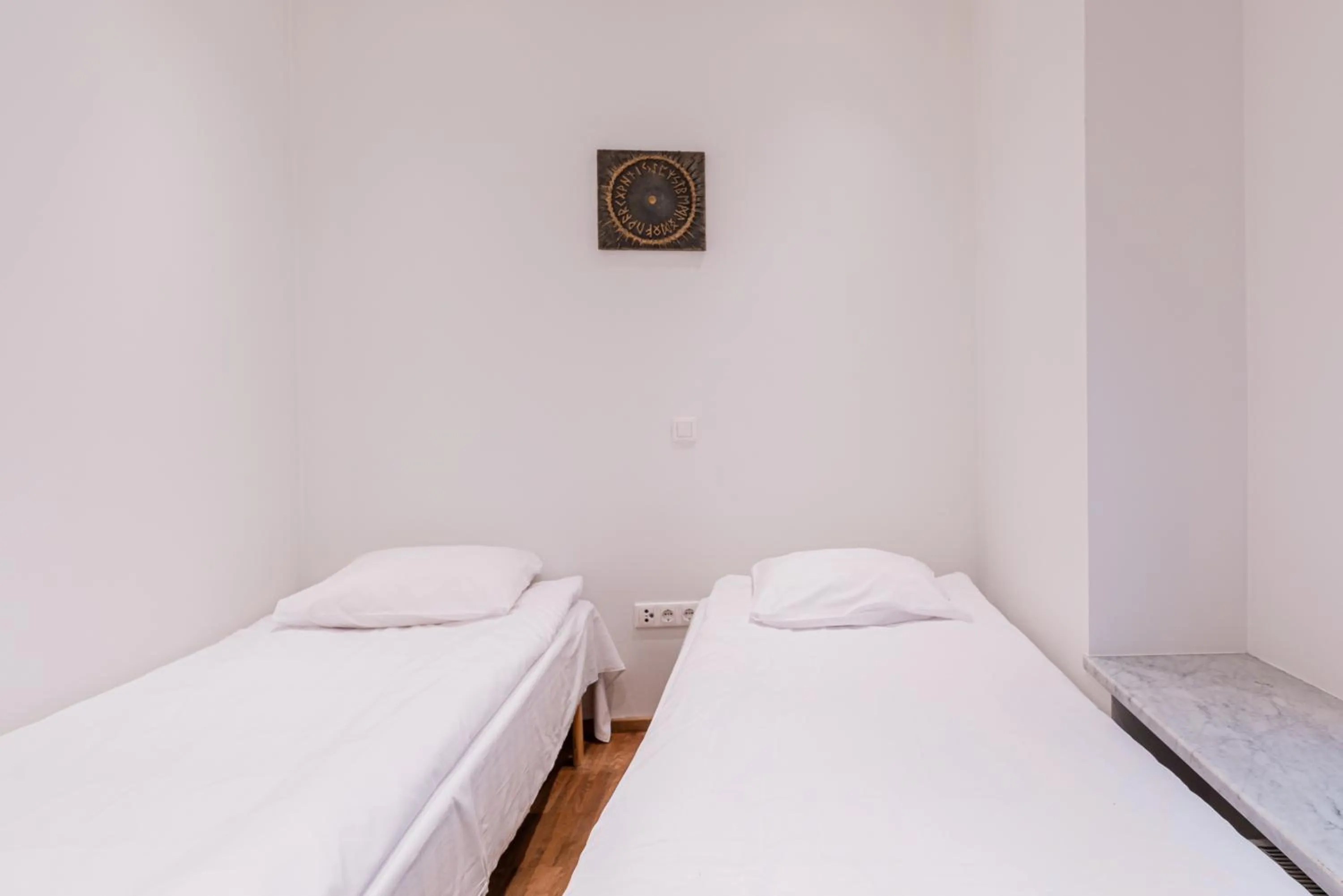 Bed in Yoga Residence Apartments
