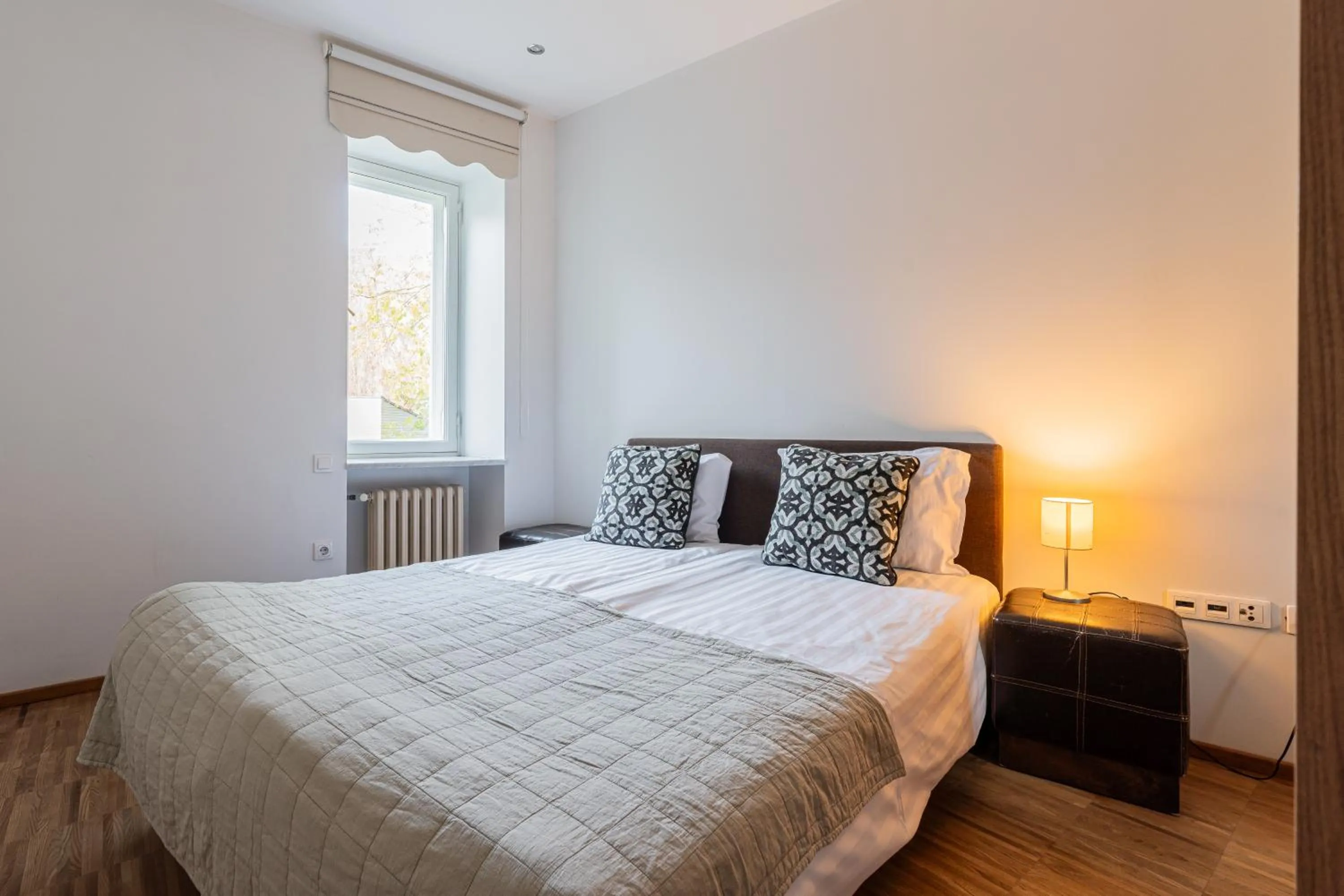 Bed in Yoga Residence Apartments