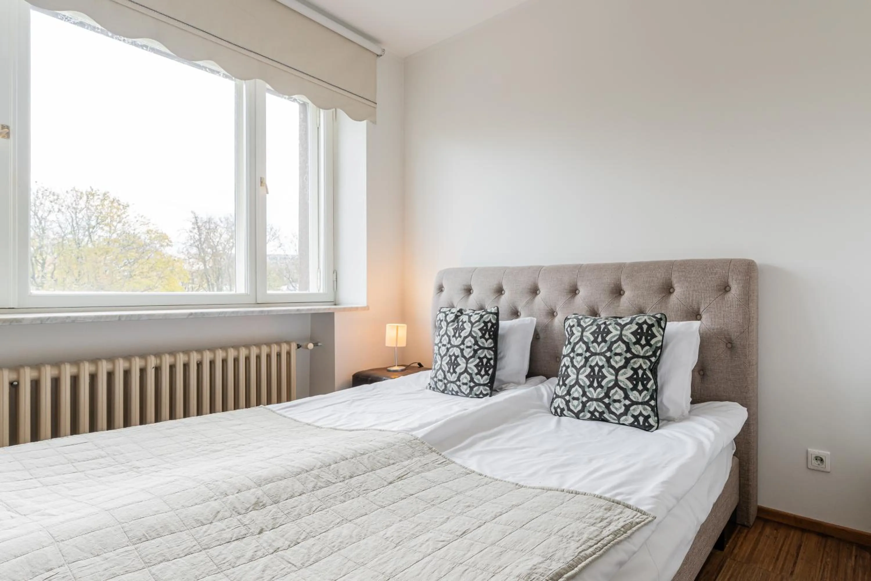 Bed in Yoga Residence Apartments