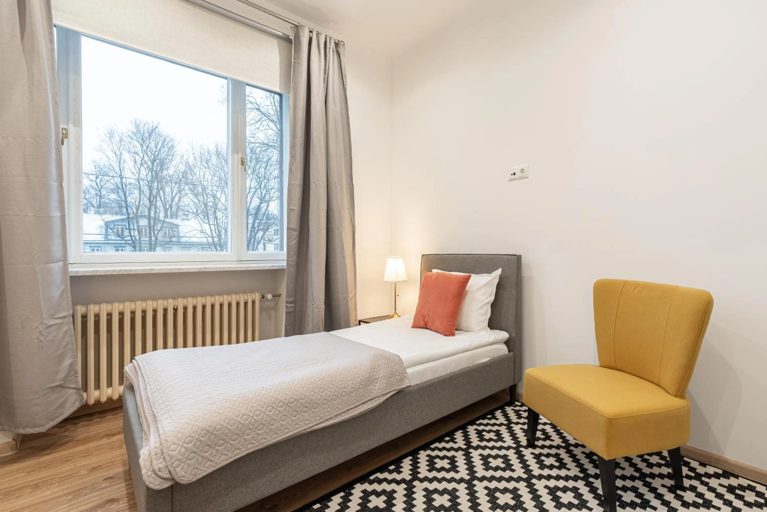 Bed in Yoga Residence Apartments