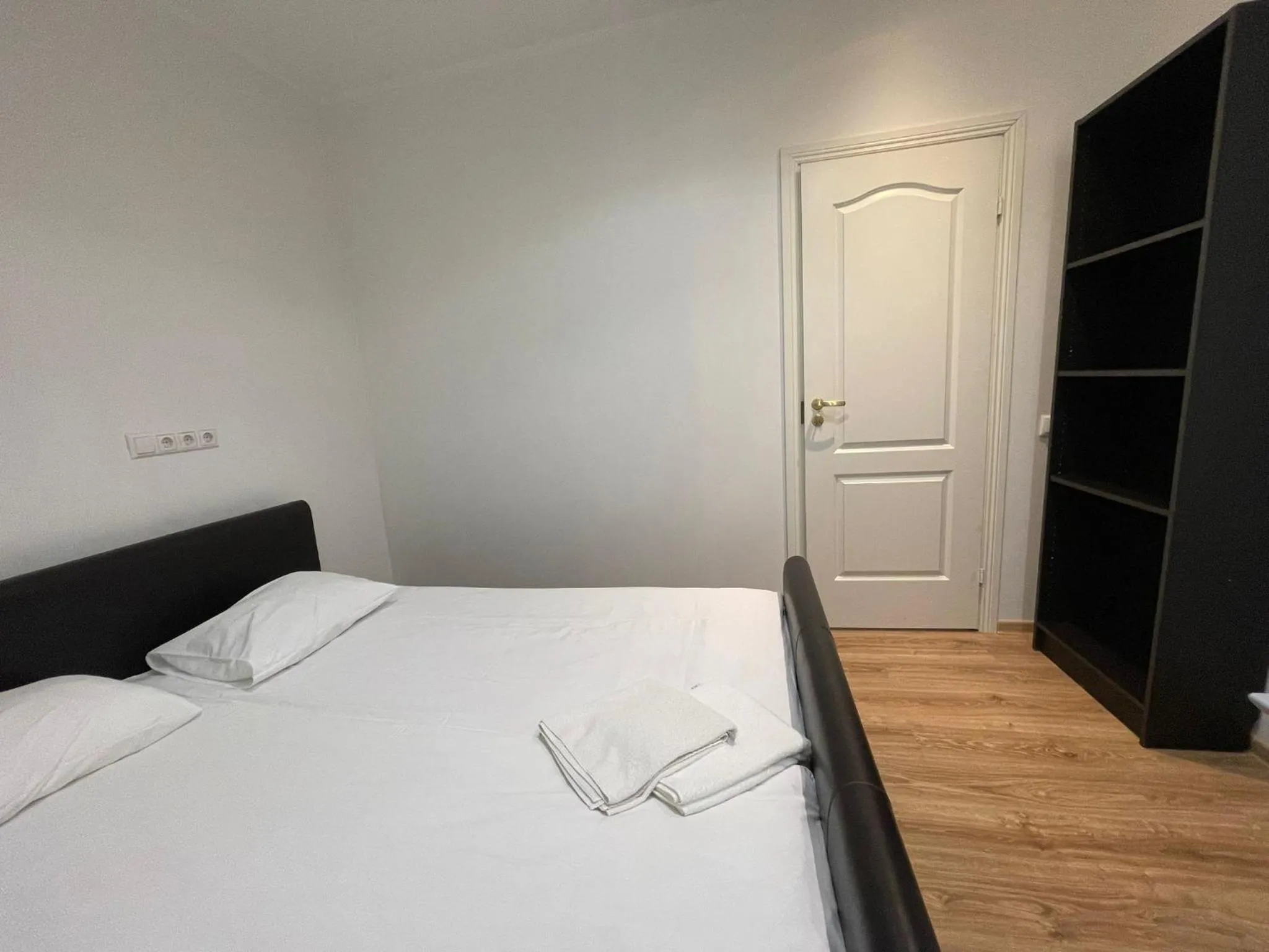 Bed in Yoga Residence Apartments