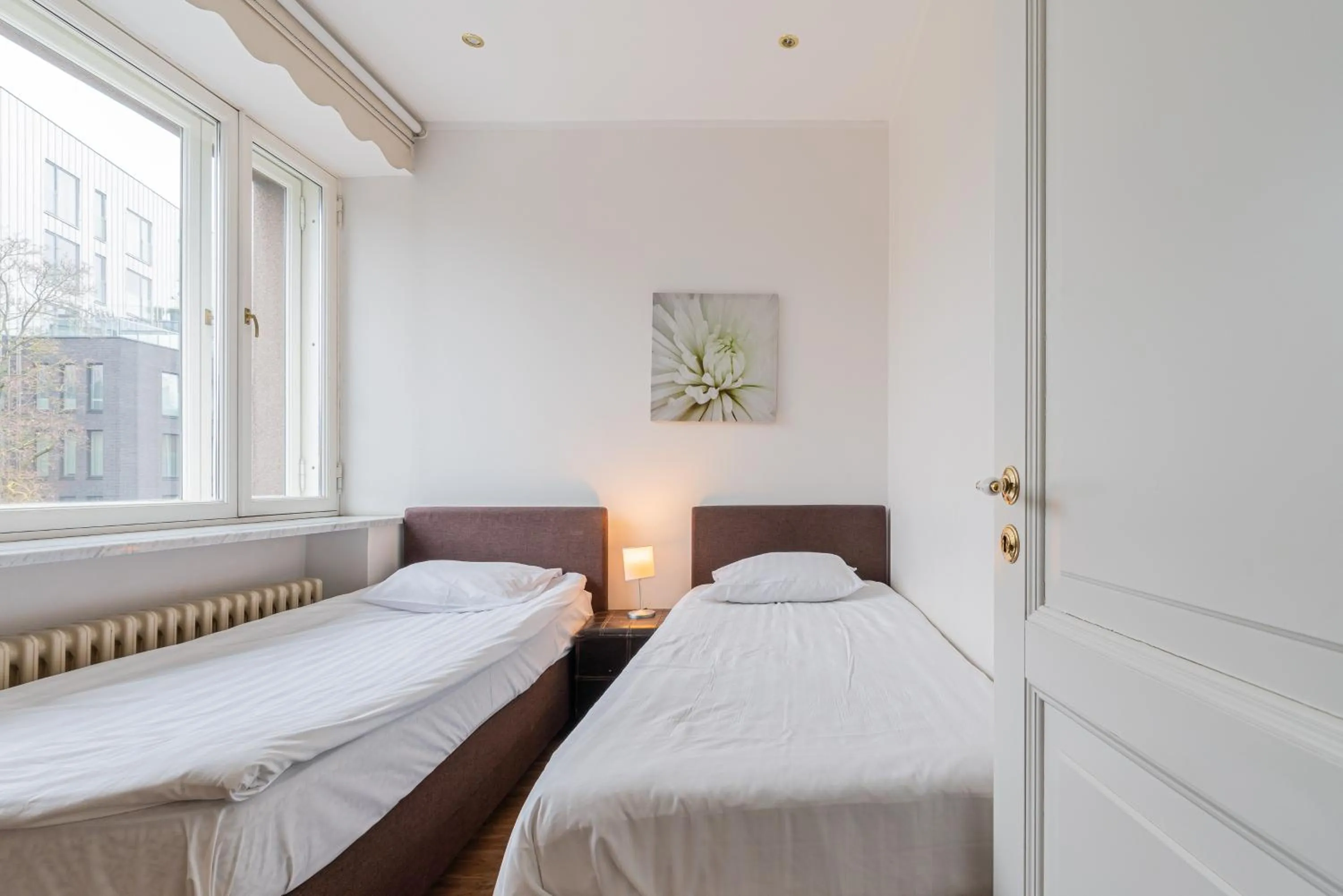 Bed in Yoga Residence Apartments