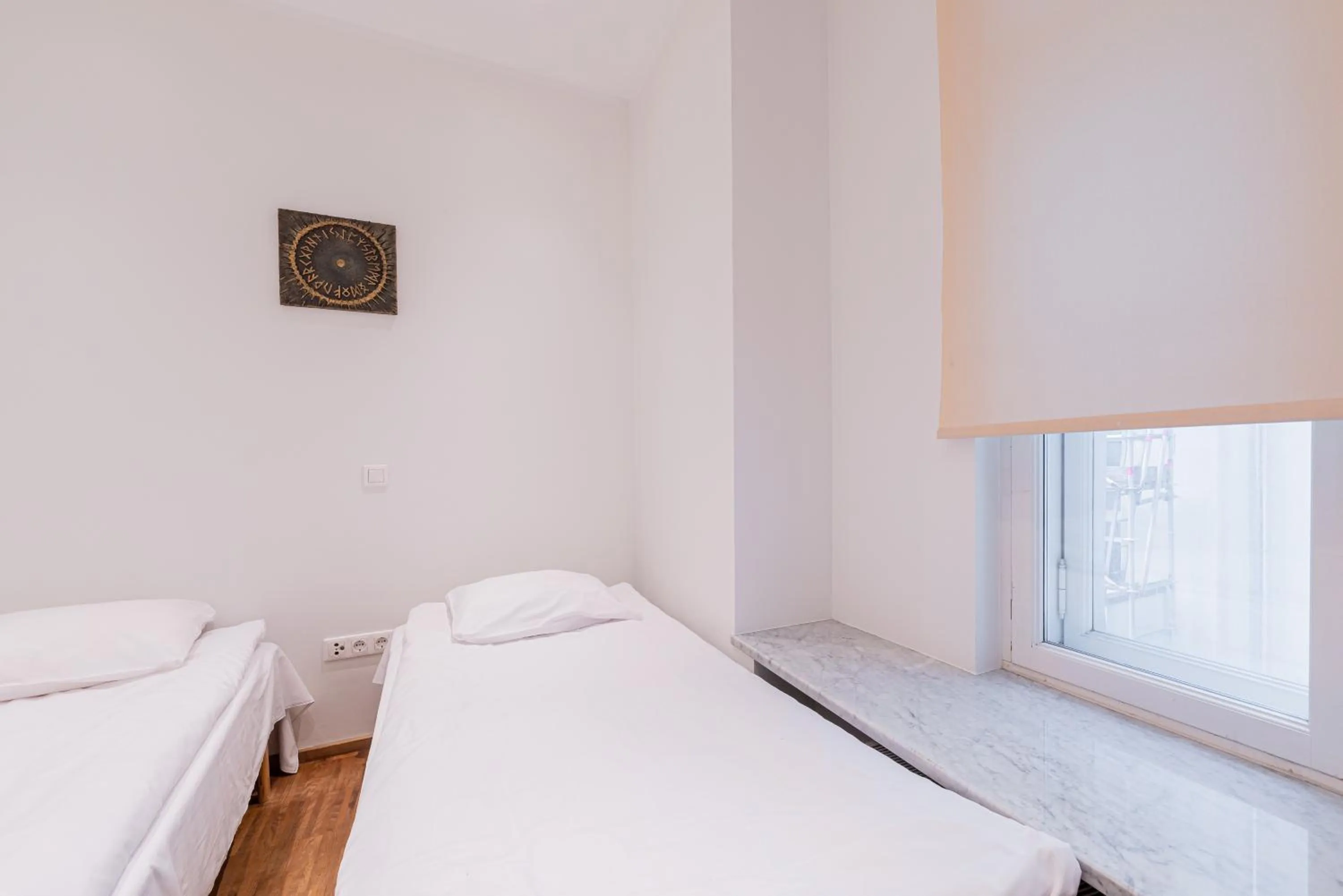 Bed in Yoga Residence Apartments