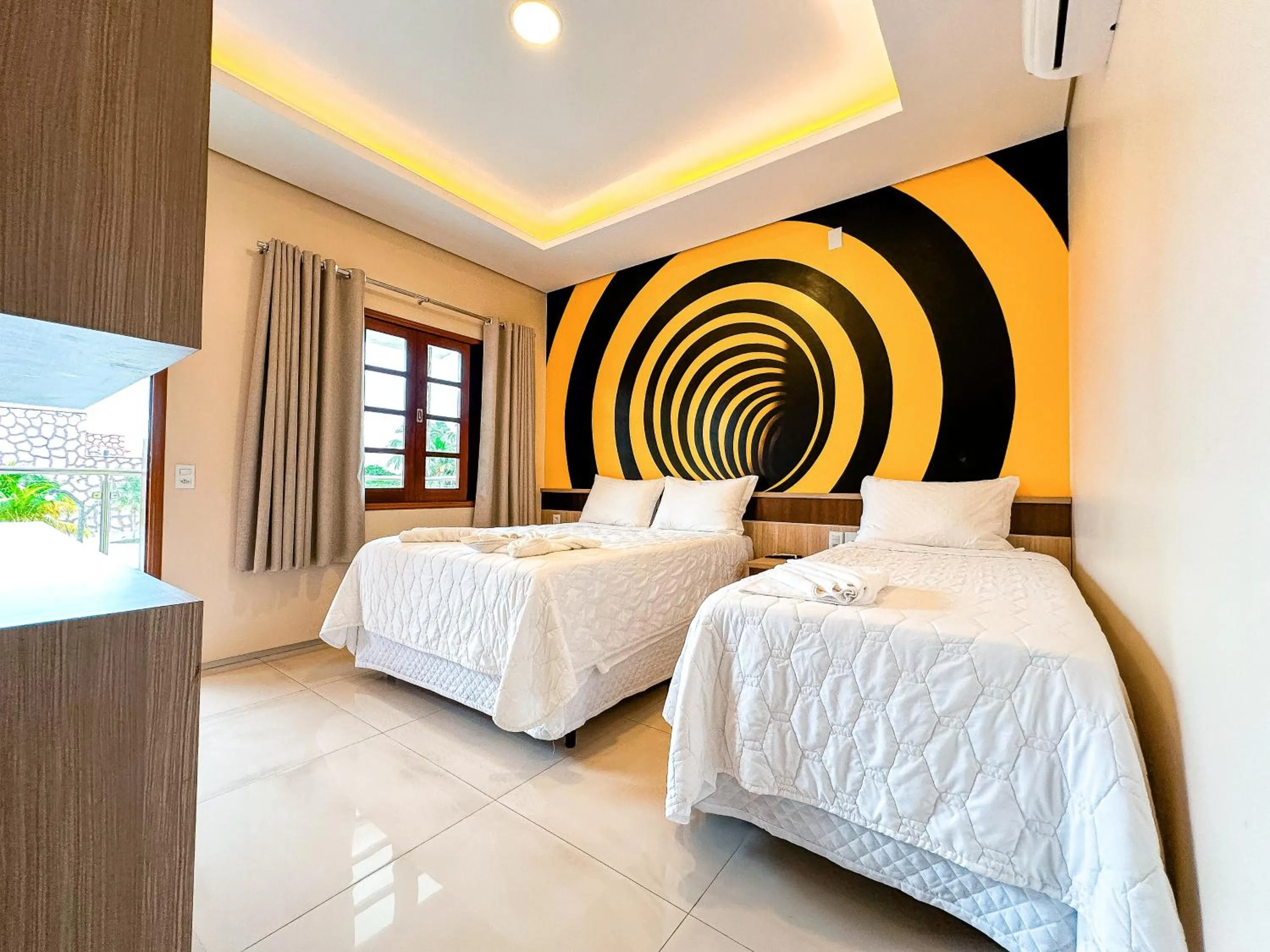 Bed in Pousada Lençóis Maranhenses