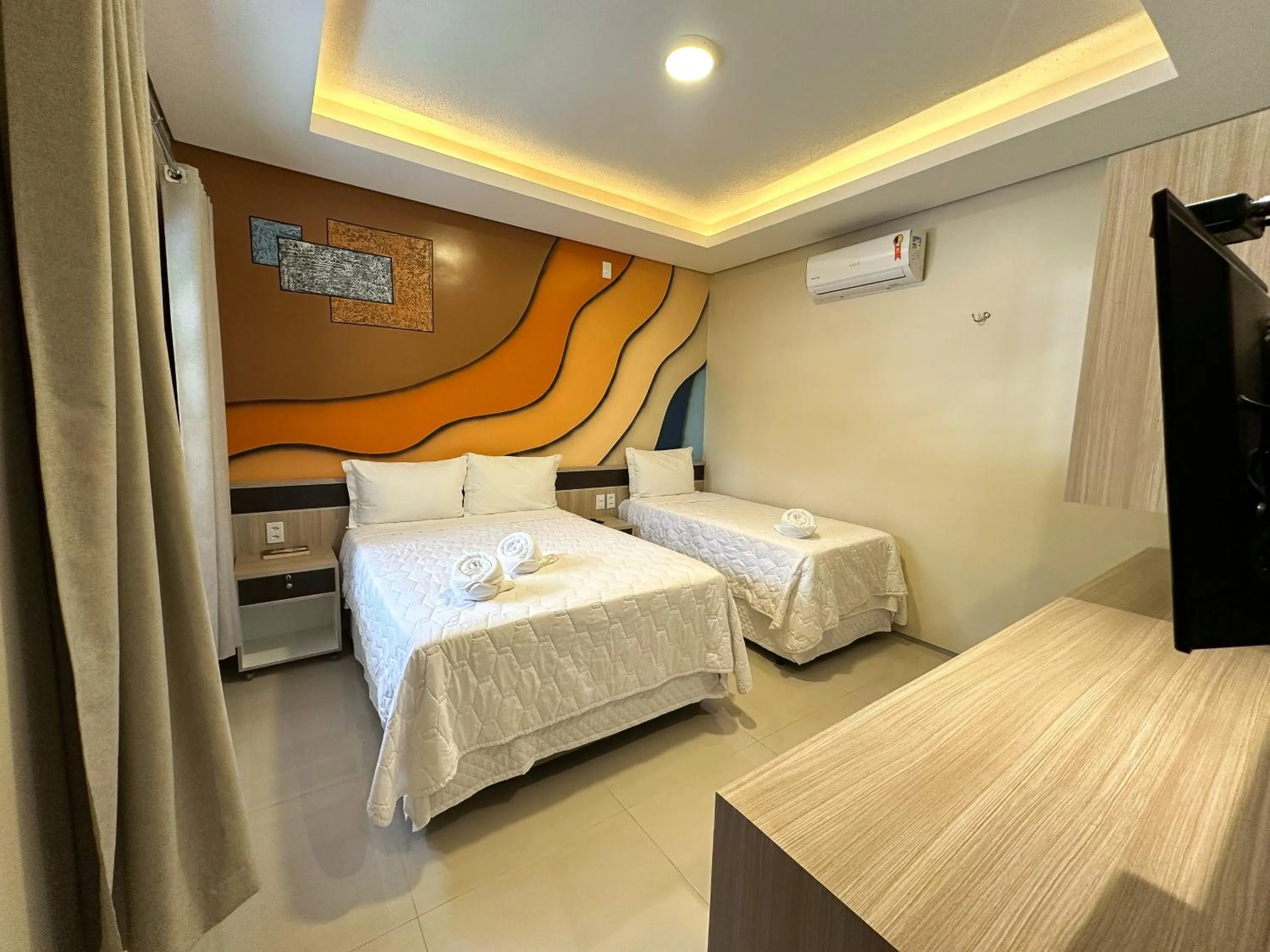 Bed in Pousada Lençóis Maranhenses