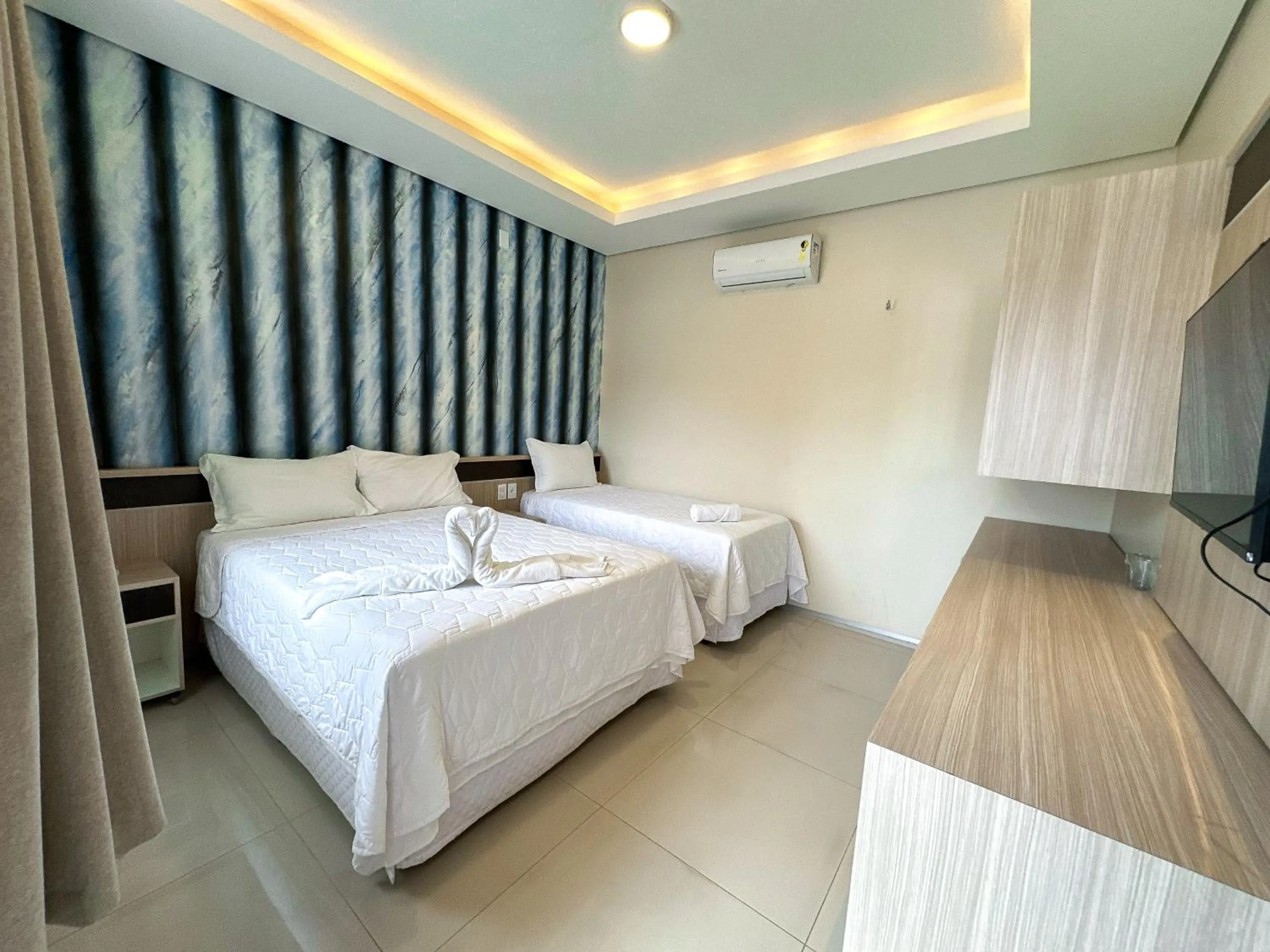 Bed in Pousada Lençóis Maranhenses