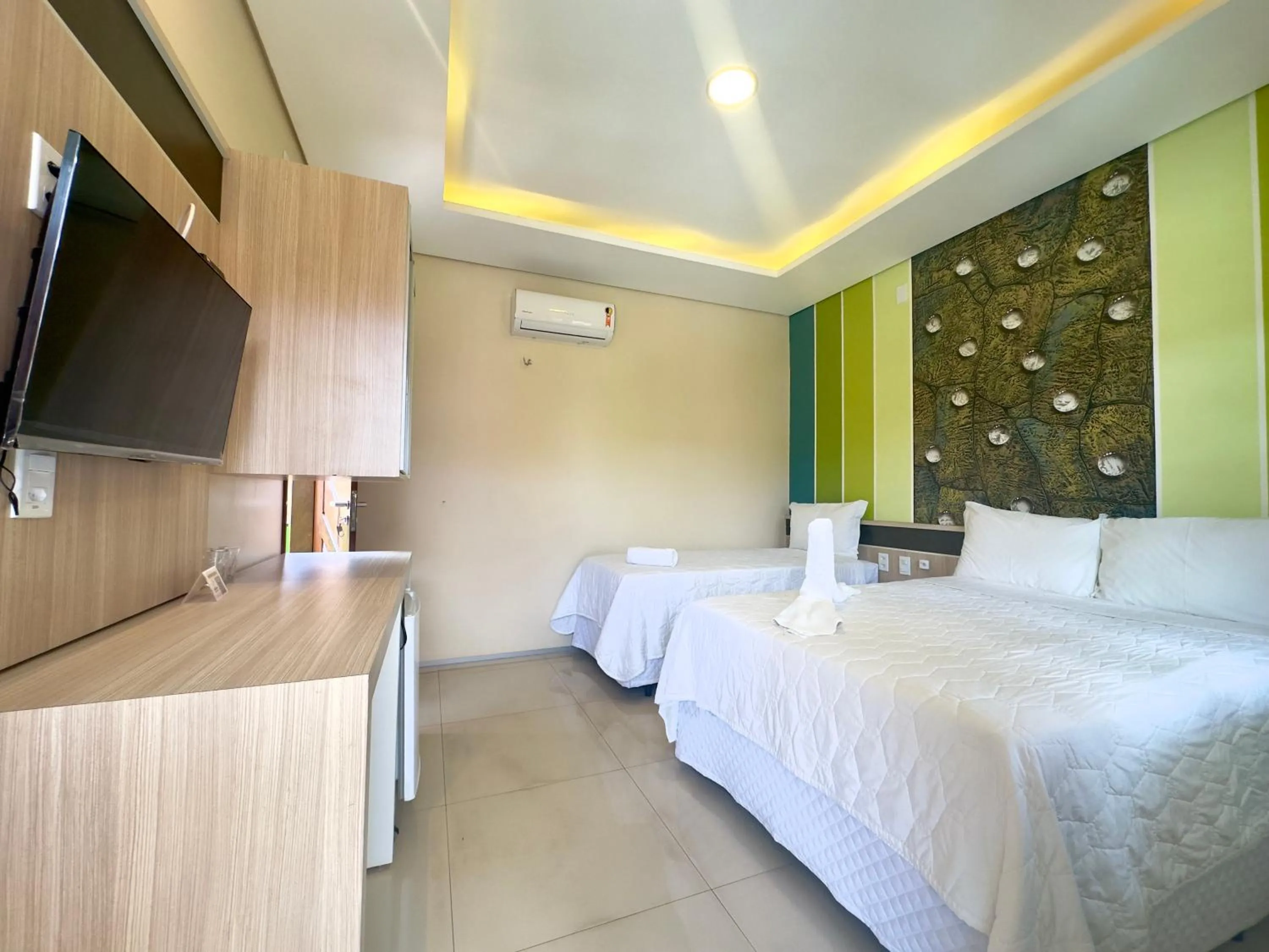 Bed in Pousada Lençóis Maranhenses