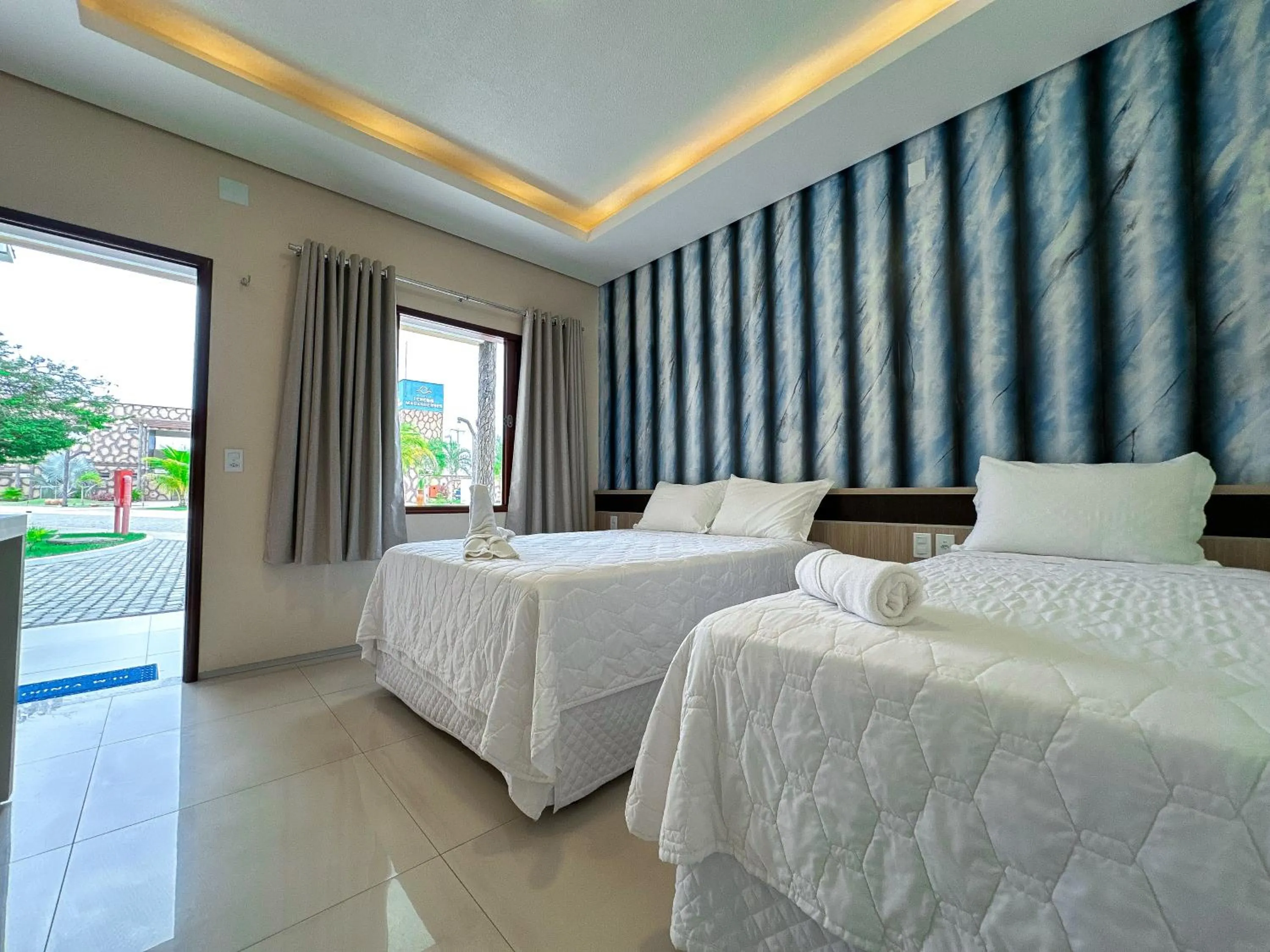 Bed in Pousada Lençóis Maranhenses