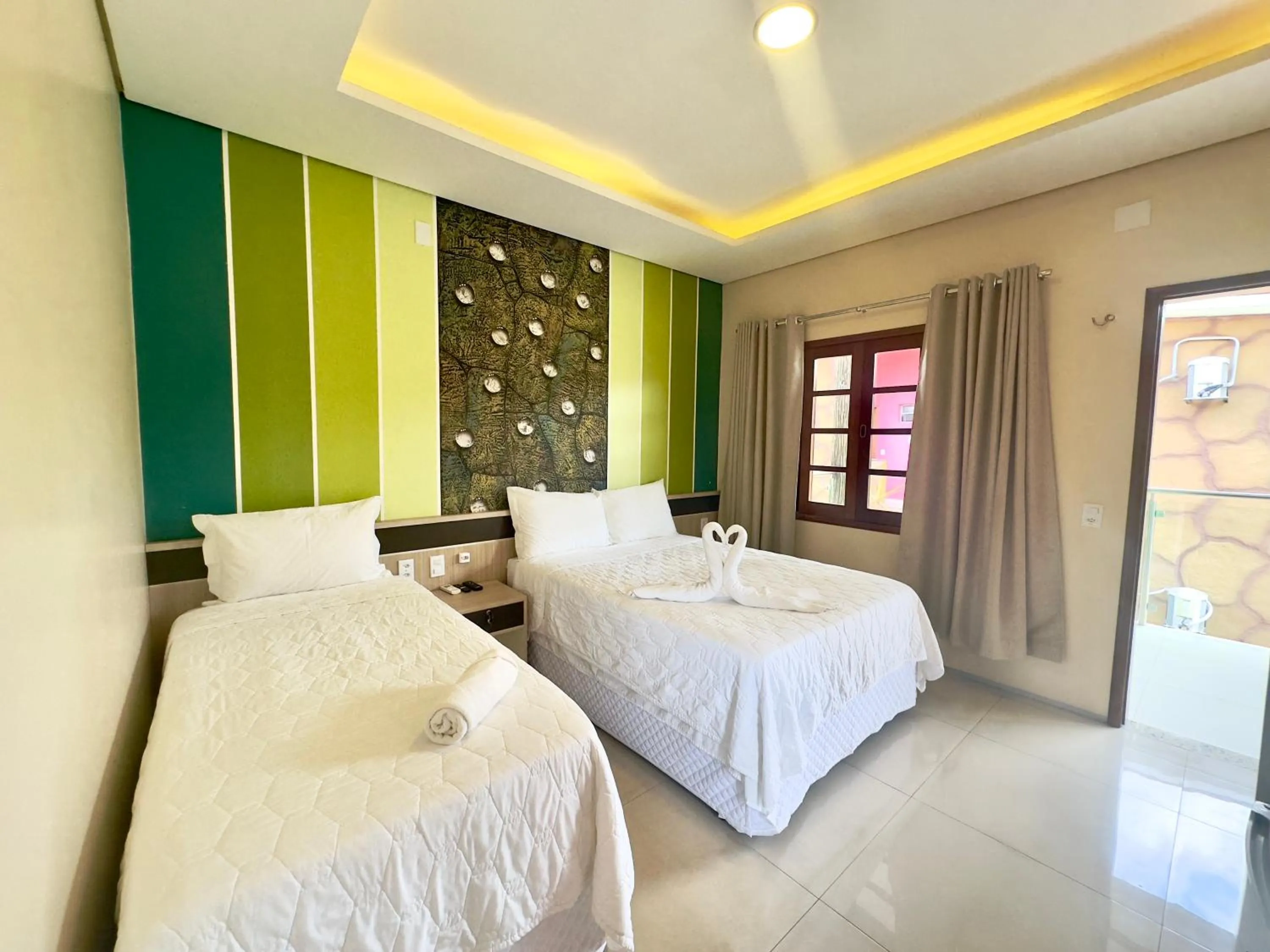 Bed in Pousada Lençóis Maranhenses