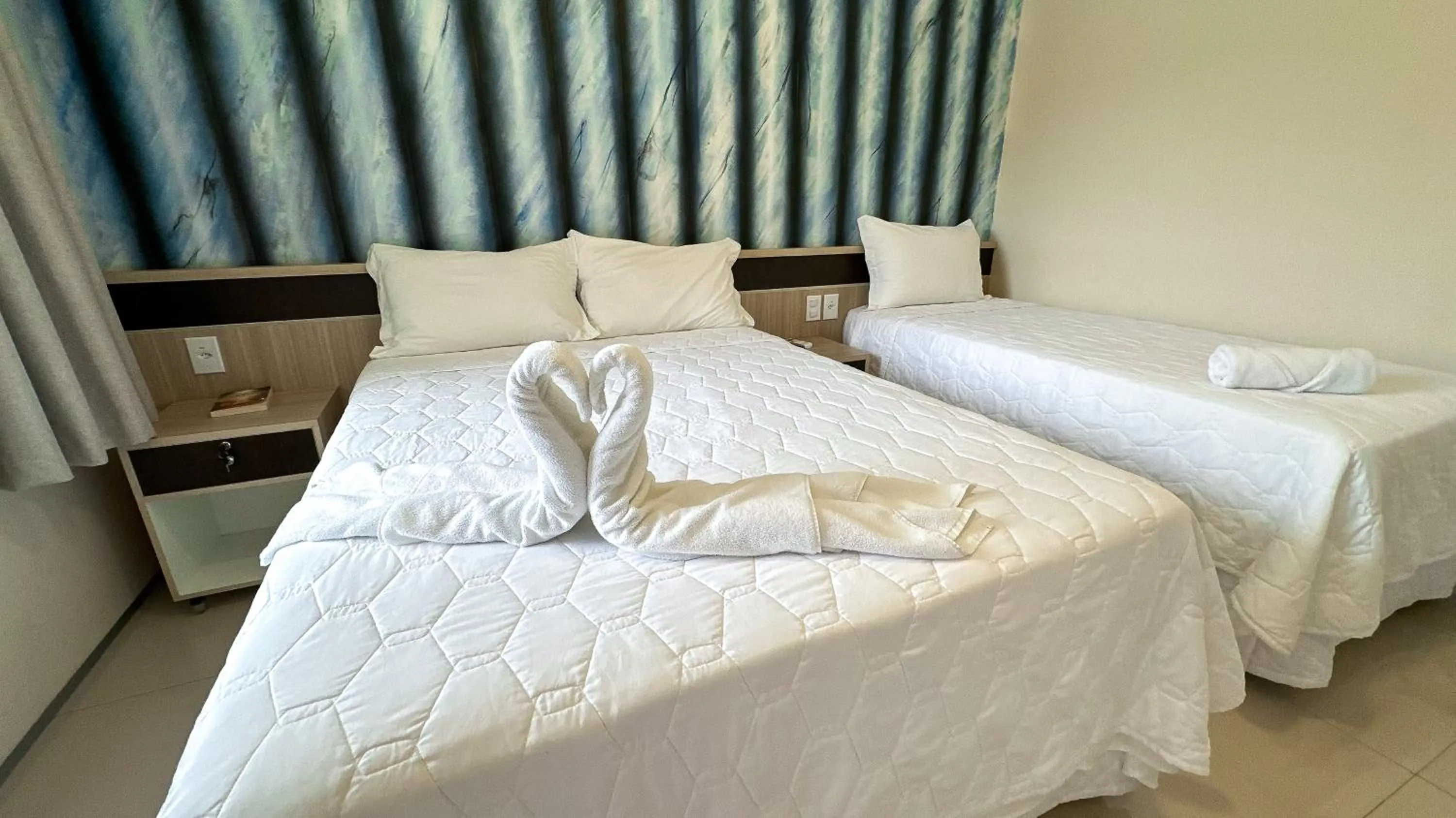 Bed in Pousada Lençóis Maranhenses