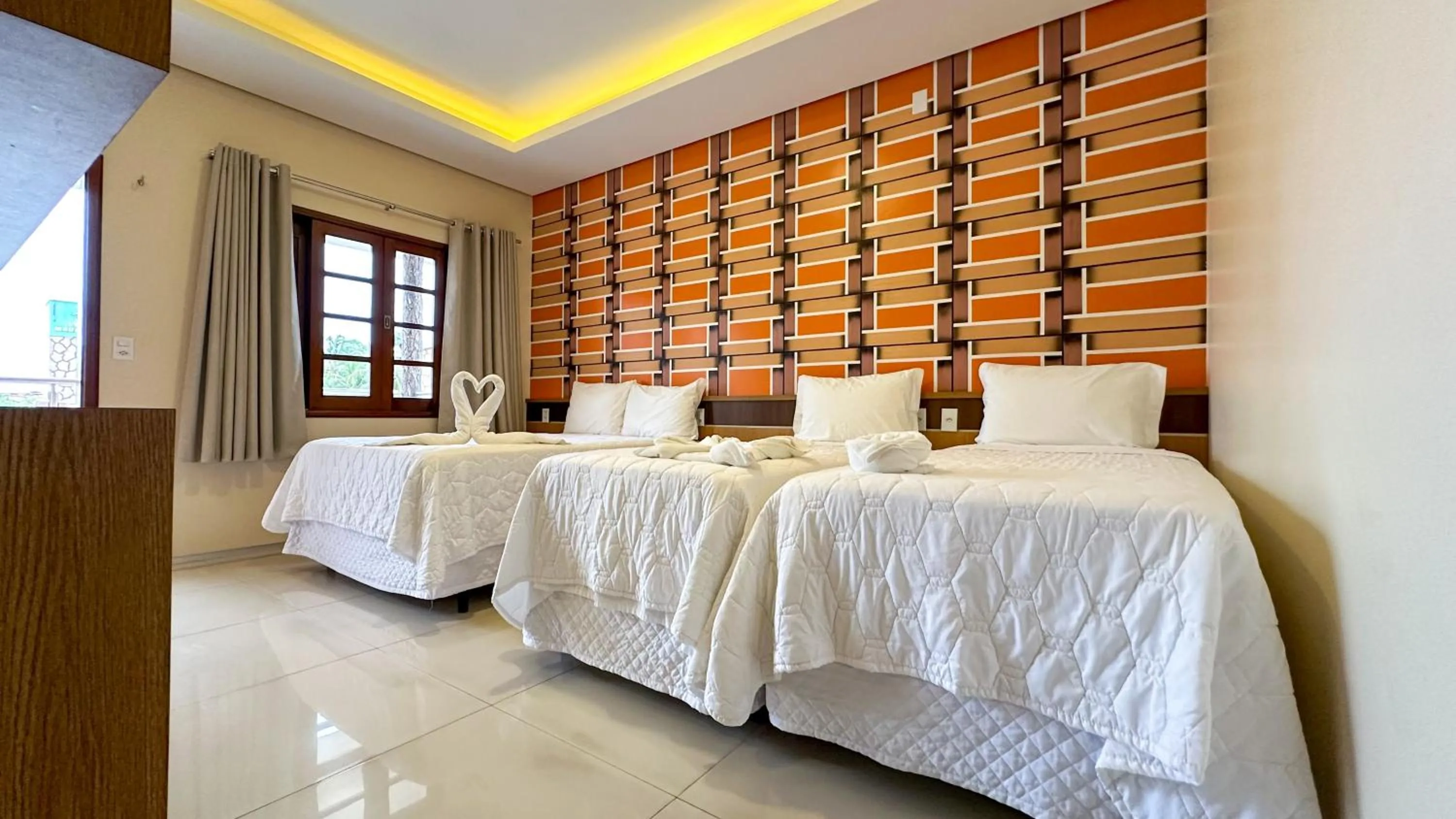 Bed in Pousada Lençóis Maranhenses