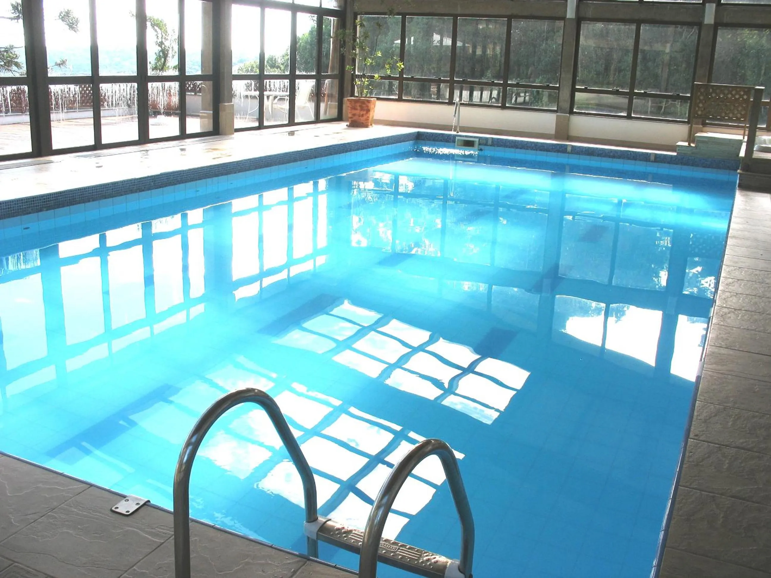 Swimming pool in Flat em Gramado