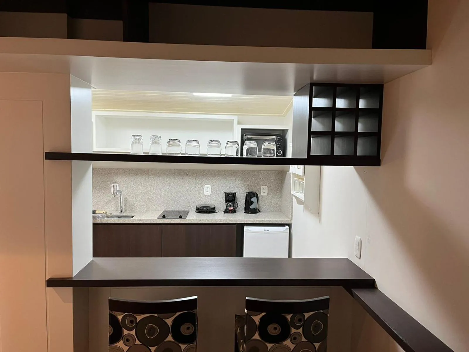 Kitchen or kitchenette in Flat em Gramado