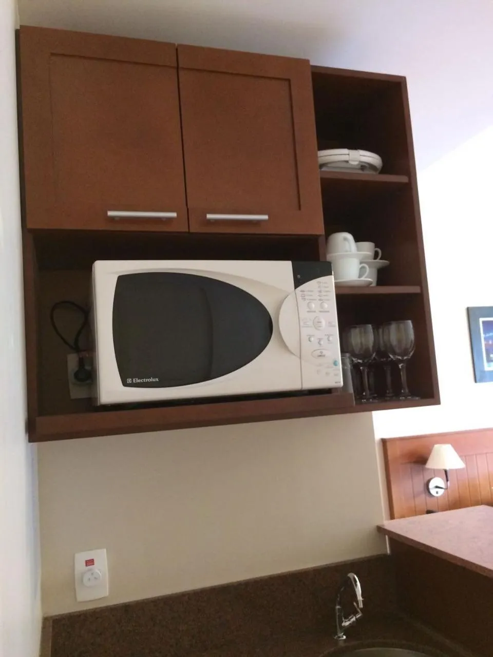 Kitchen or kitchenette in Flat em Gramado