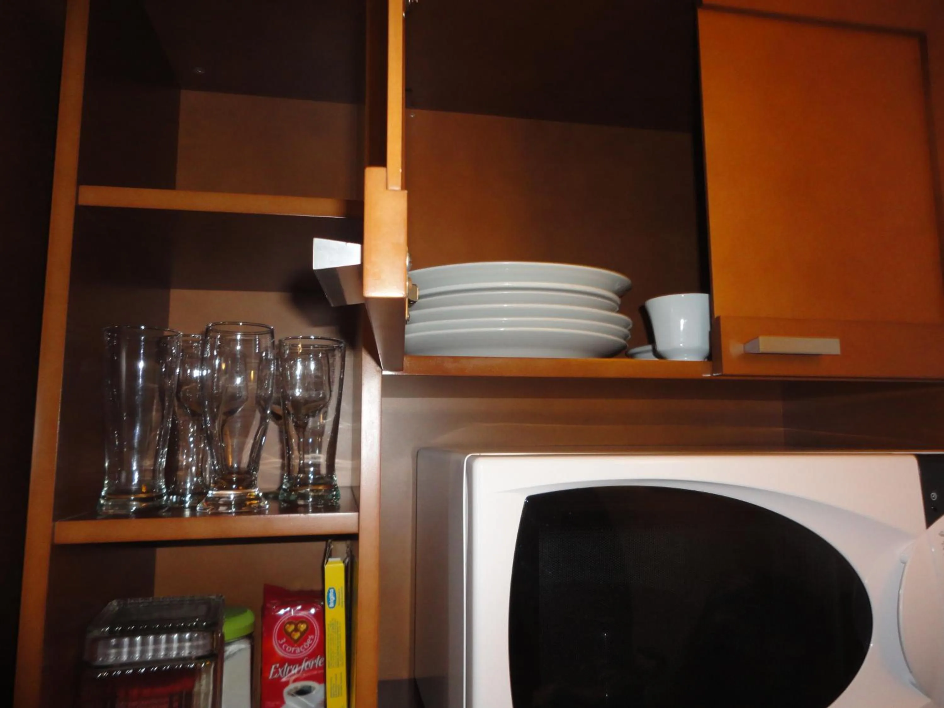 Kitchen or kitchenette in Flat em Gramado