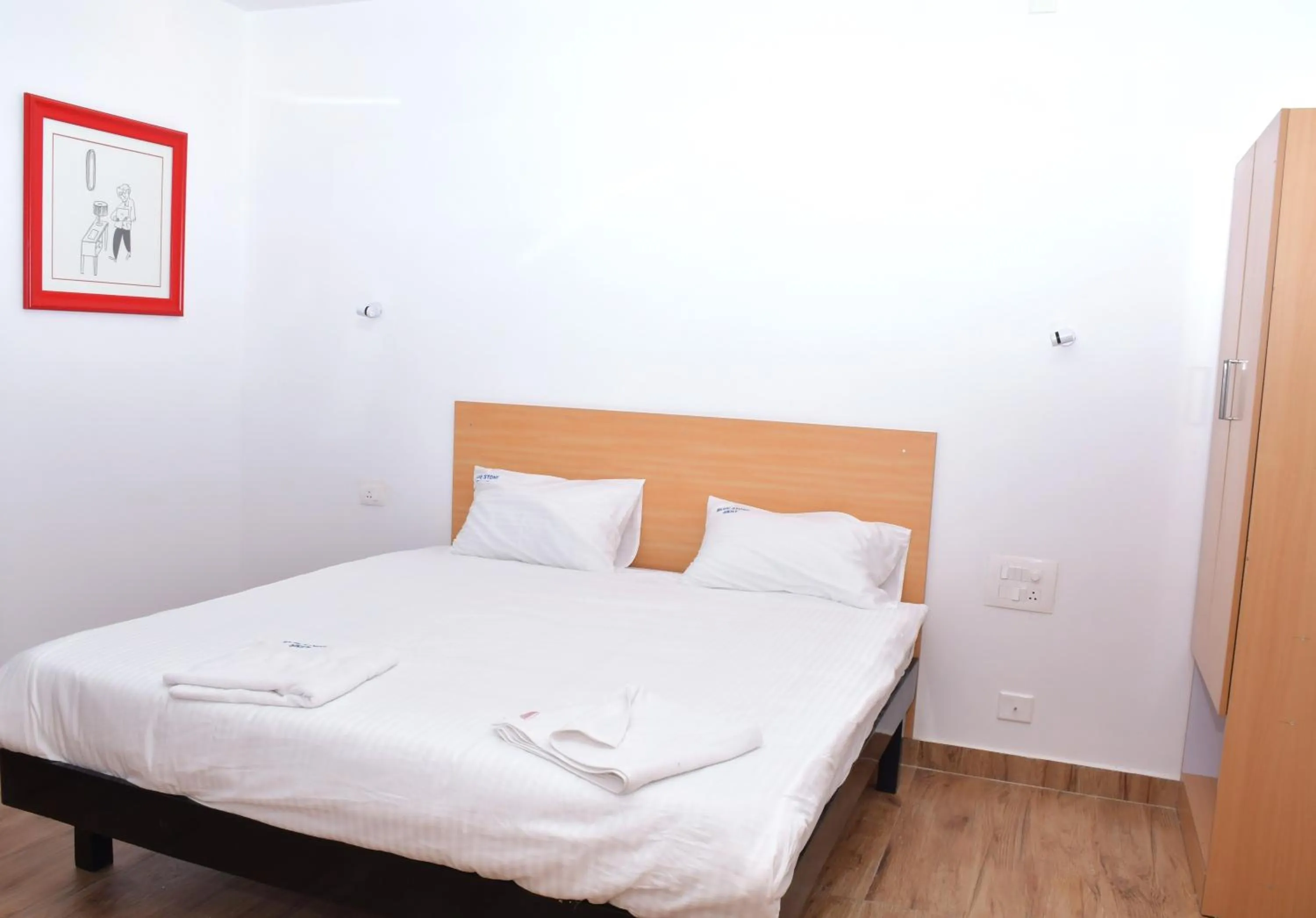 Bed in Hotel Bluestone