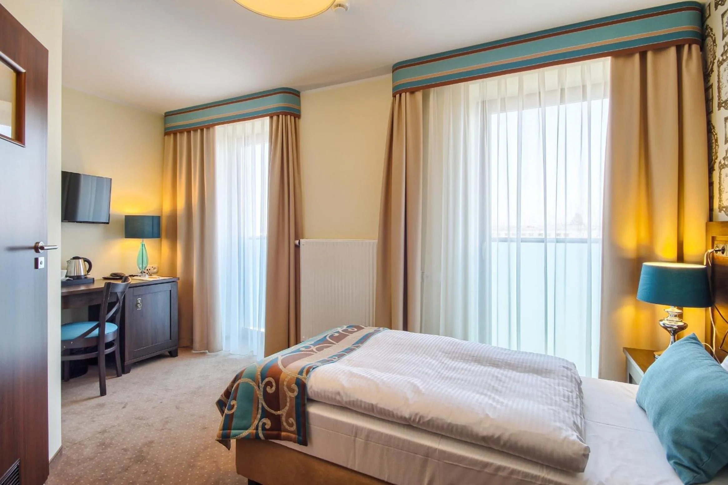 Decorative detail, Bed in Hotel Opole Centrum