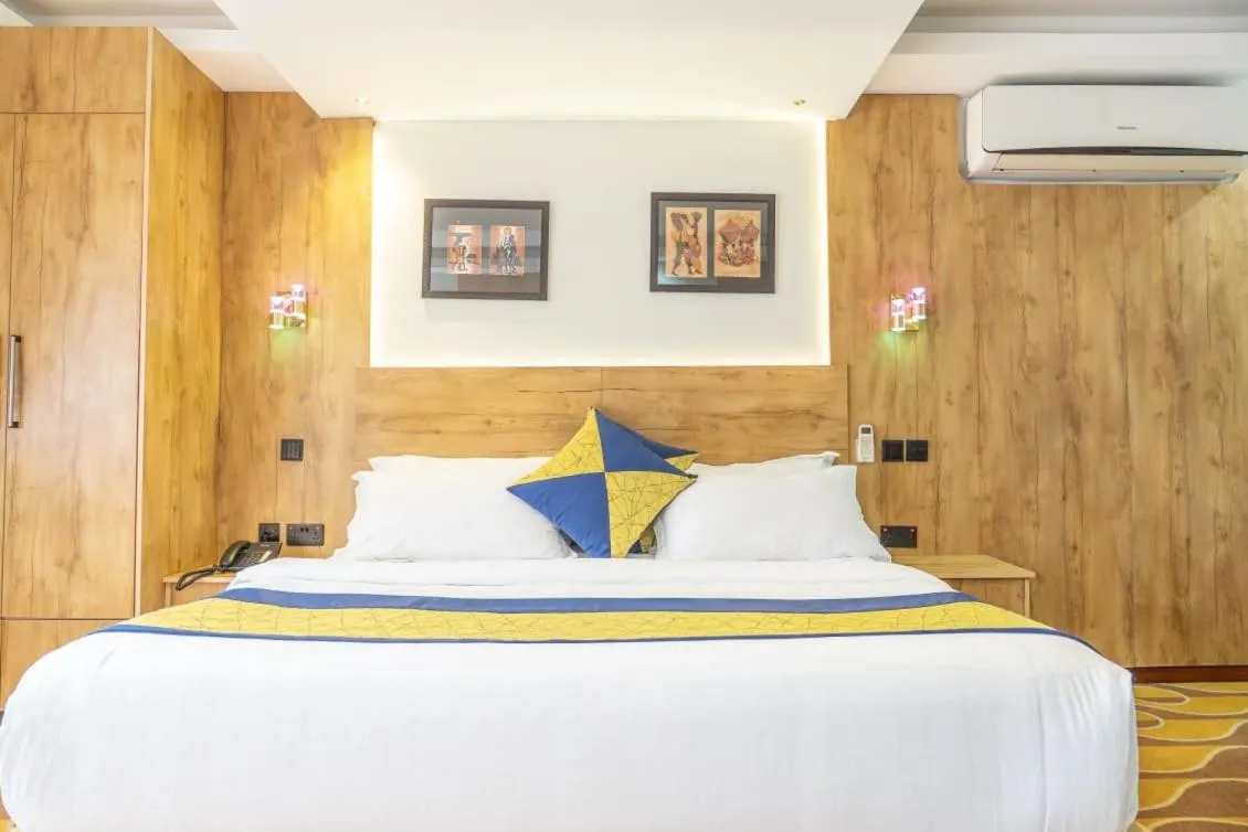 Bed in Afro Park Hotel