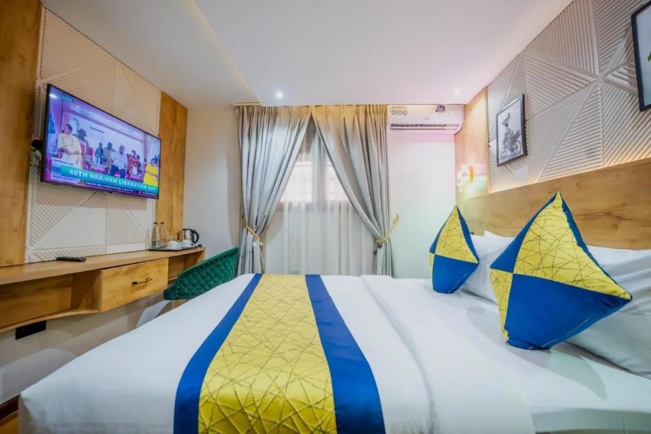 Bed in Afro Park Hotel