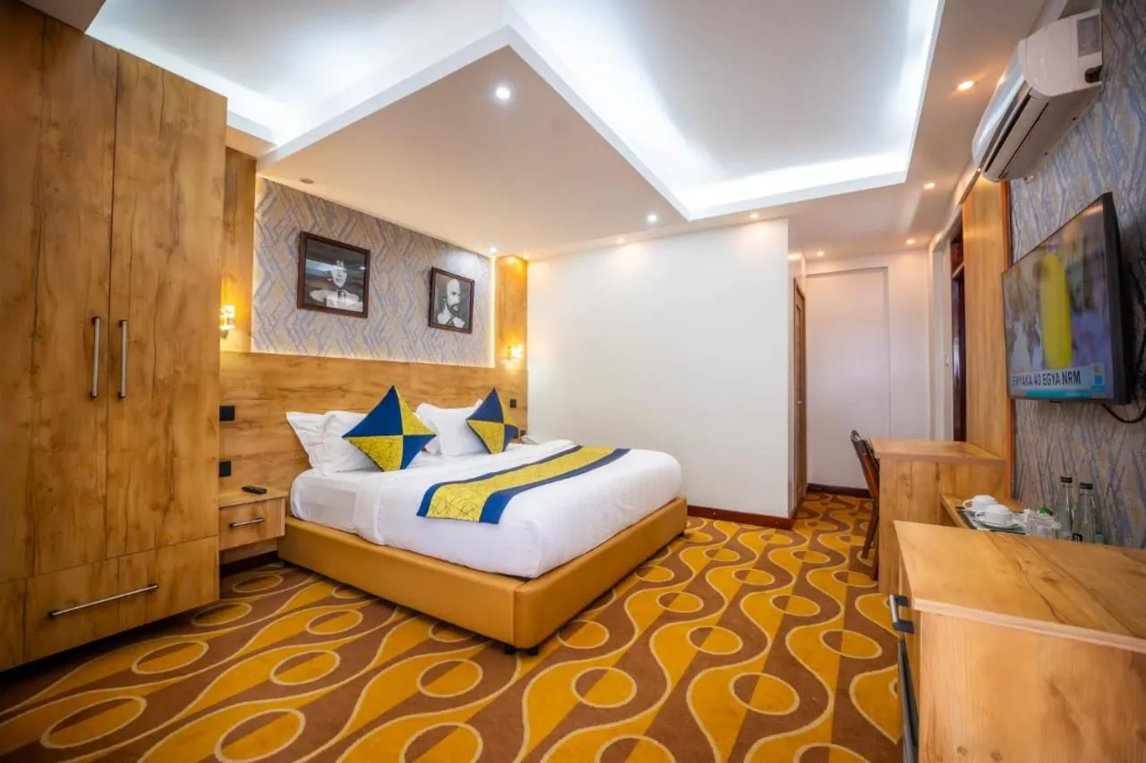 Bed in Afro Park Hotel