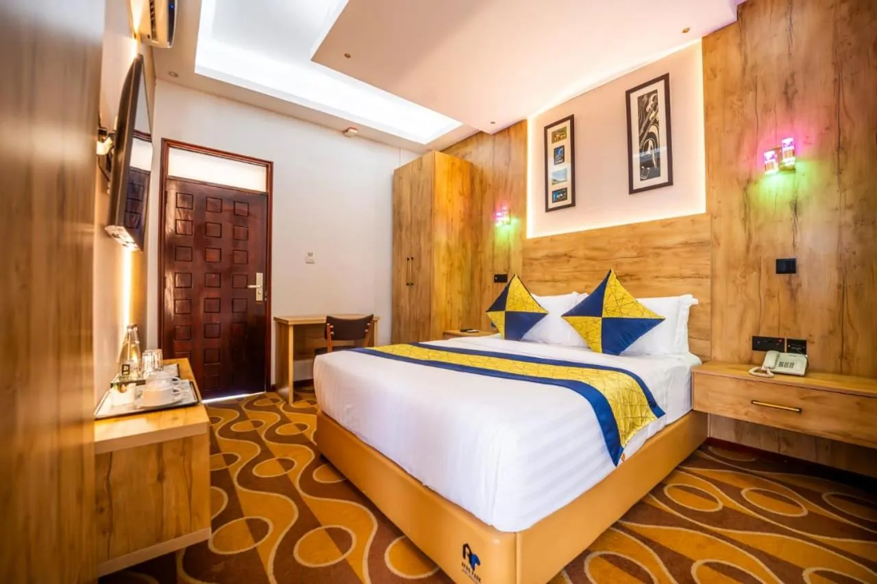 Bed in Afro Park Hotel