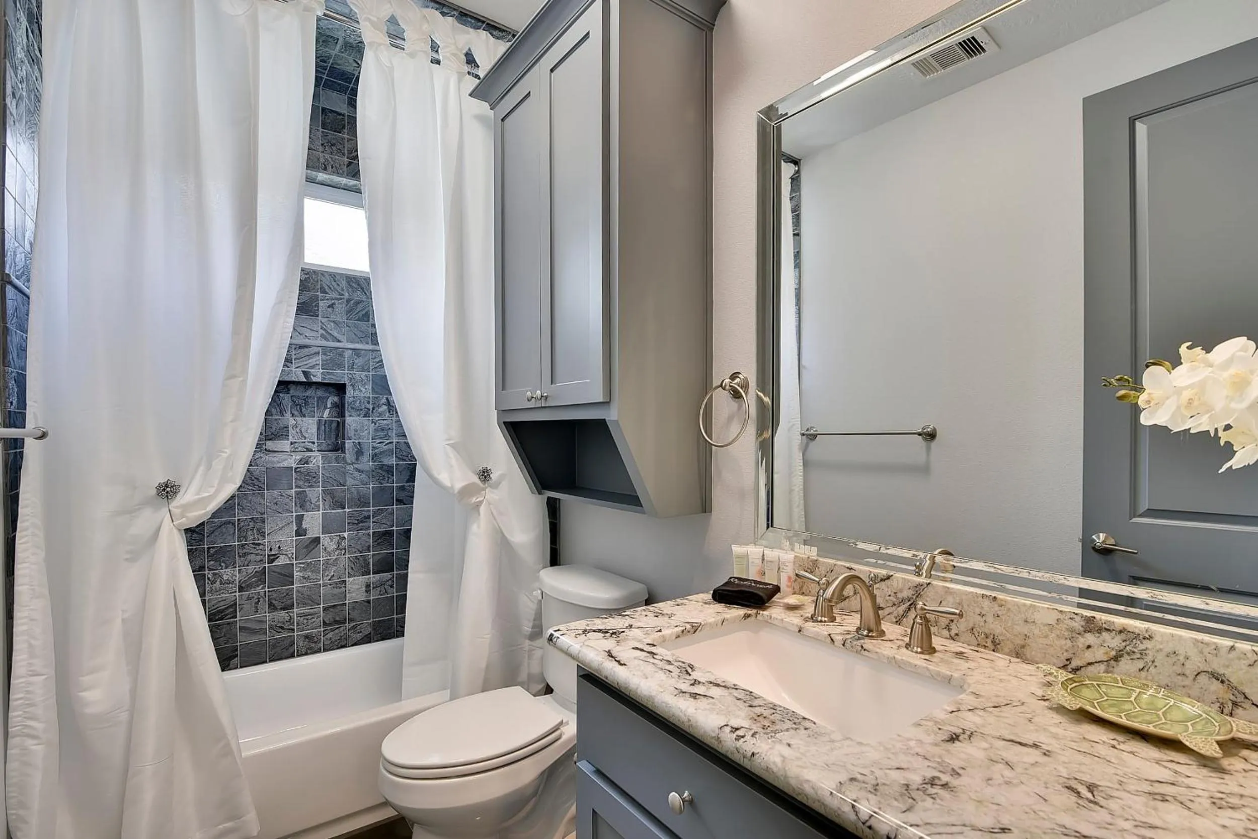 Bathroom in Honu Beachfront by Ryson Vacation Rentals