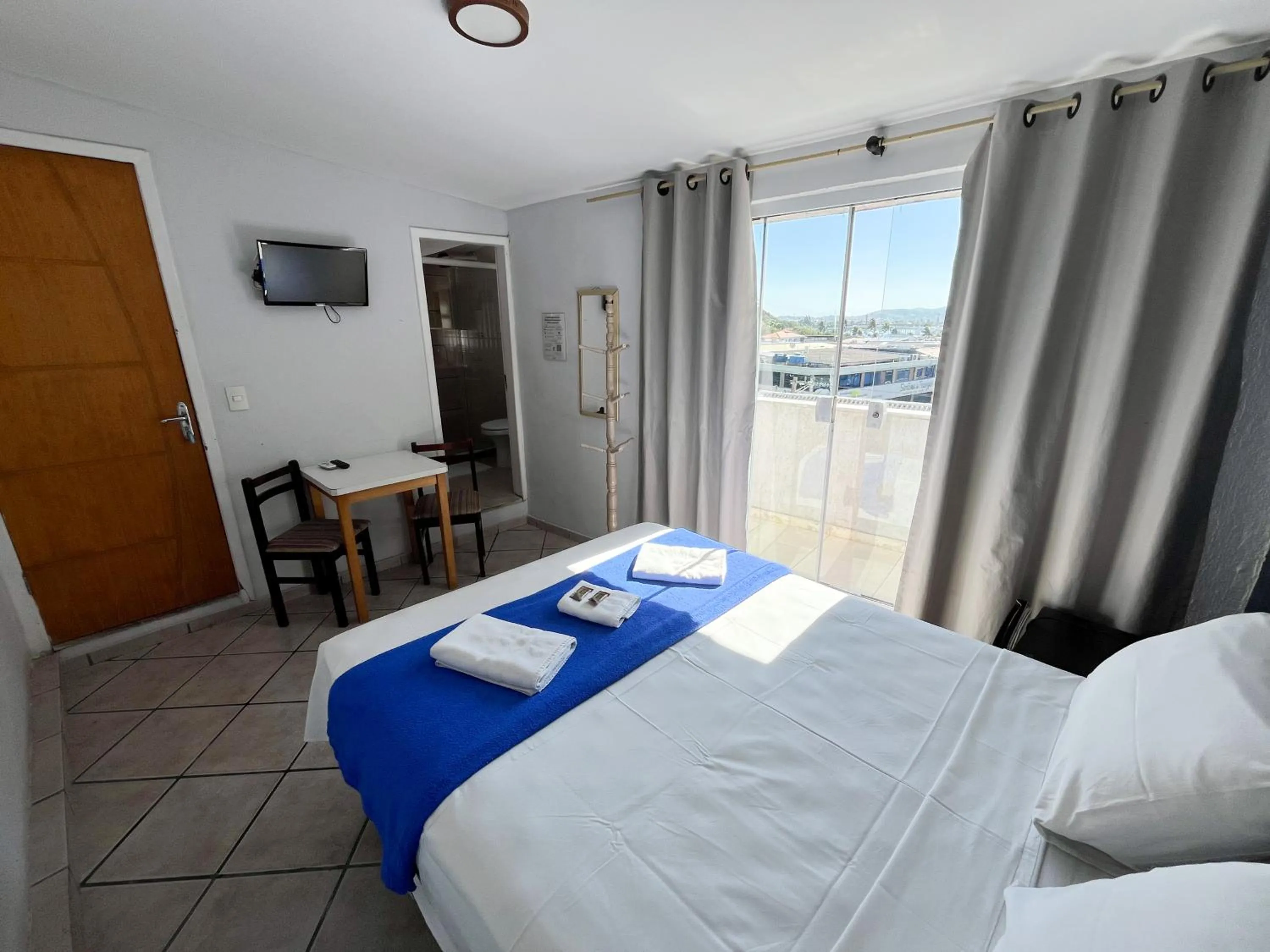 Photo of the whole room, Bed in Pousada Vila Appia