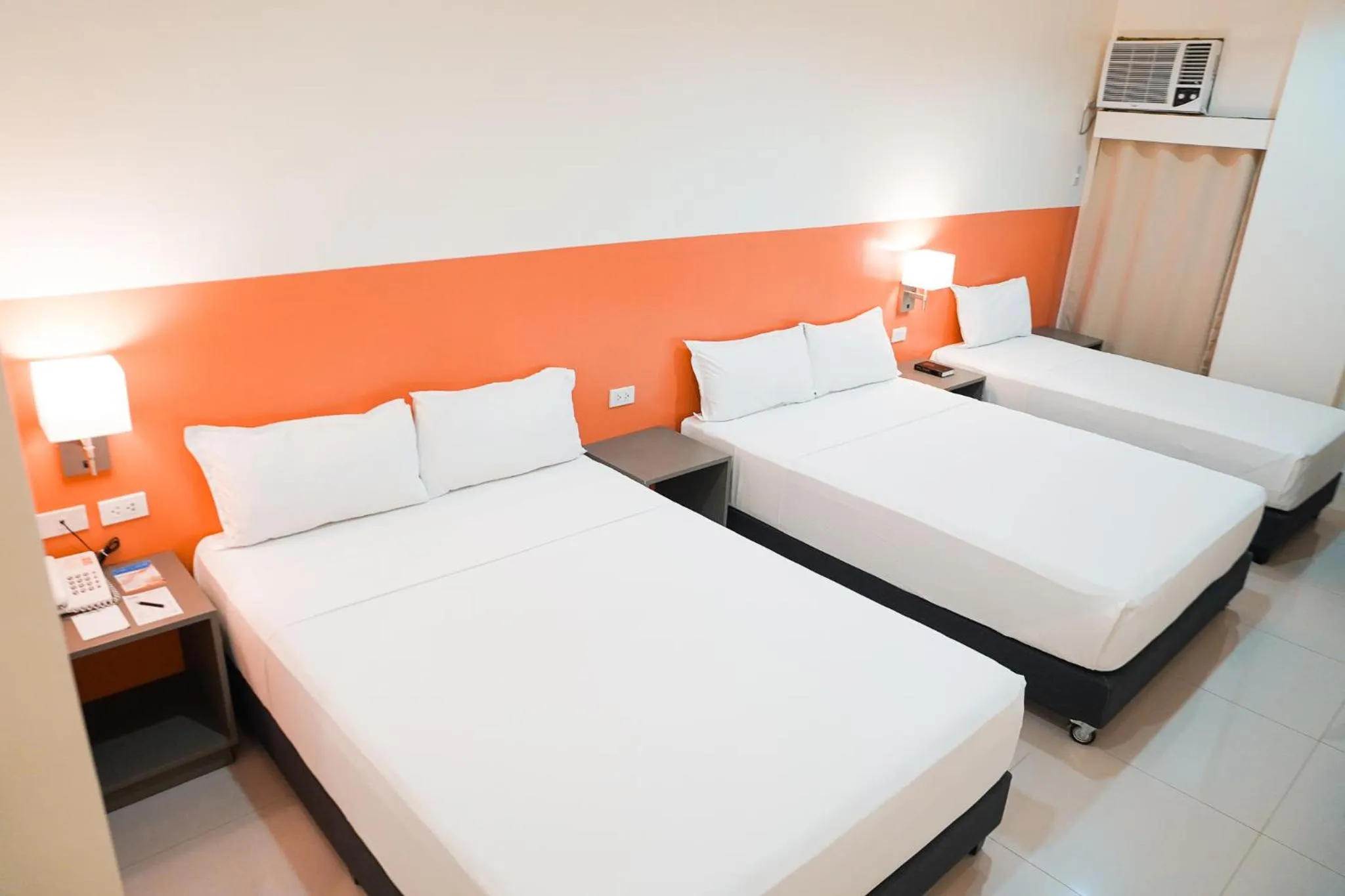 Bedroom in Travelbee Airport Inn