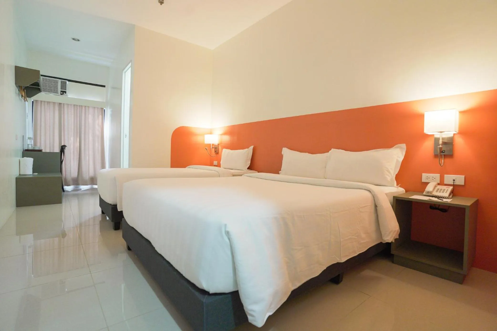 Bedroom in Travelbee Airport Inn