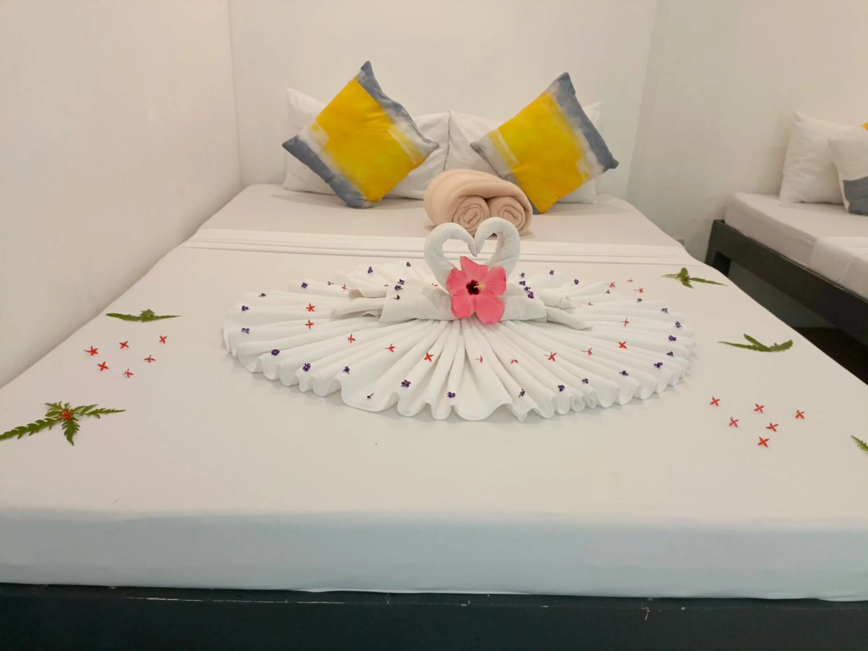 Bed in Palmera El Nido Inn