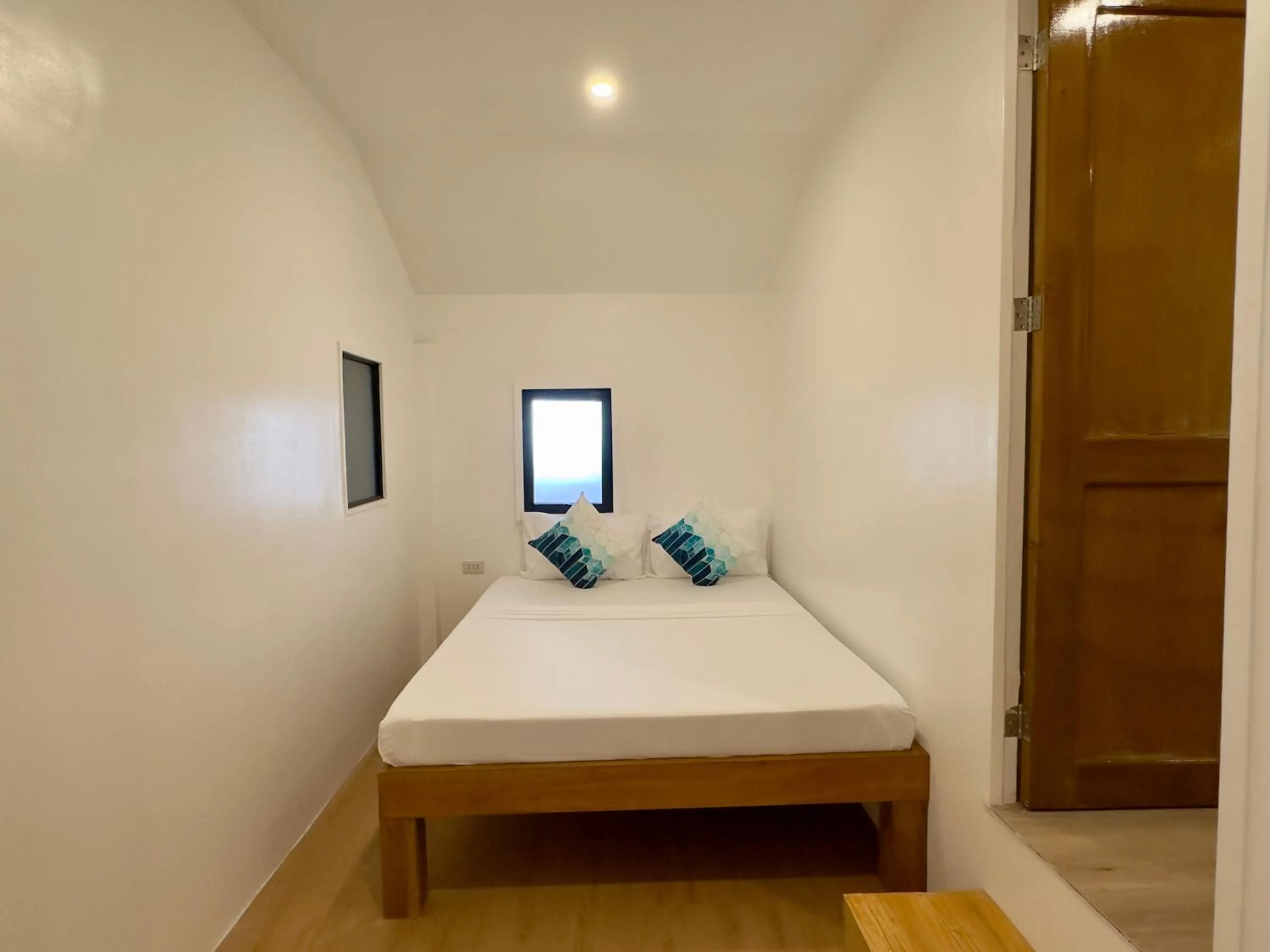 Bed in Palmera El Nido Inn